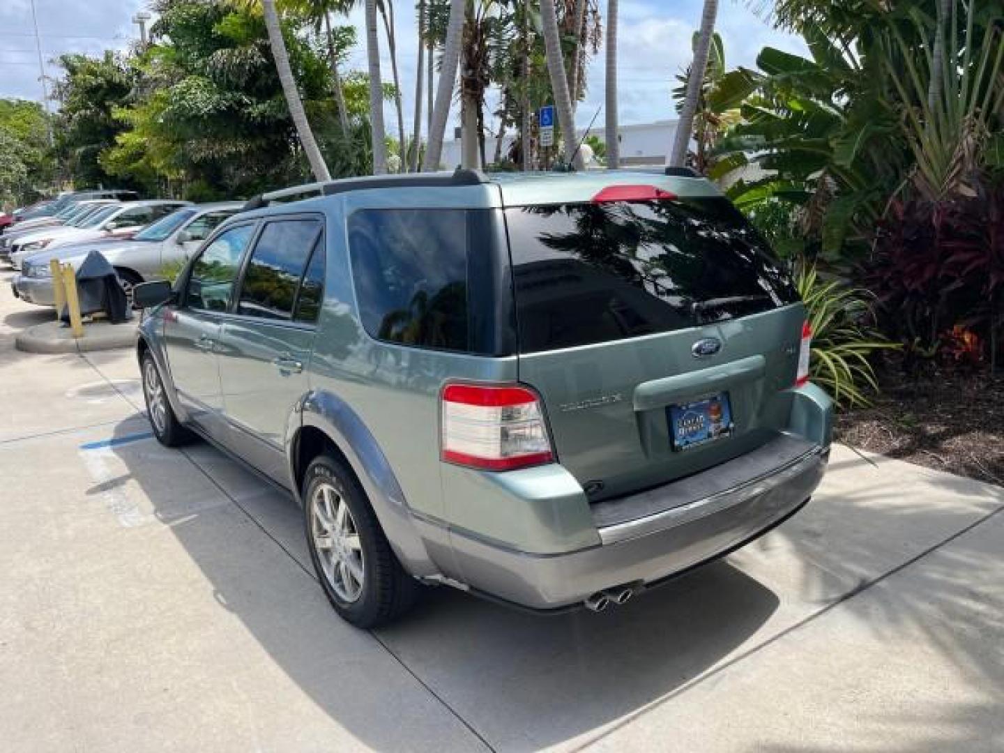 2008 Titanium Green Metallic /Camel Ford Taurus X 1 FL SEL LOW MILES 65,186 3RD ROW (1FMDK02W48G) with an 3.5L SMPI 24-Valve V6 Duratec Engine engine, Automatic transmission, located at 4701 North Dixie Hwy, Pompano Beach, FL, 33064, (954) 422-2889, 26.240938, -80.123474 - OUR WEBPAGE FLORIDACARS1.COM HAS OVER 100 PHOTOS AND FREE CARFAX LINK 2008 FORD TAURUS X SEL ROAD READY 3.5L V6 VIN: 1FMDK02W48GA18867 NO RECALLS 24 MPG 4 DOOR WAGON/SPORT UTILITY 1 OWNER FLORIDA 3.5L V6 F 3 ROW SEATS GASOLINE LOW MILES 65,186 FRONT WHEEL DRIVE POWER SEATS/MIRRORS 9 SERVICE RECORDS - Photo#5