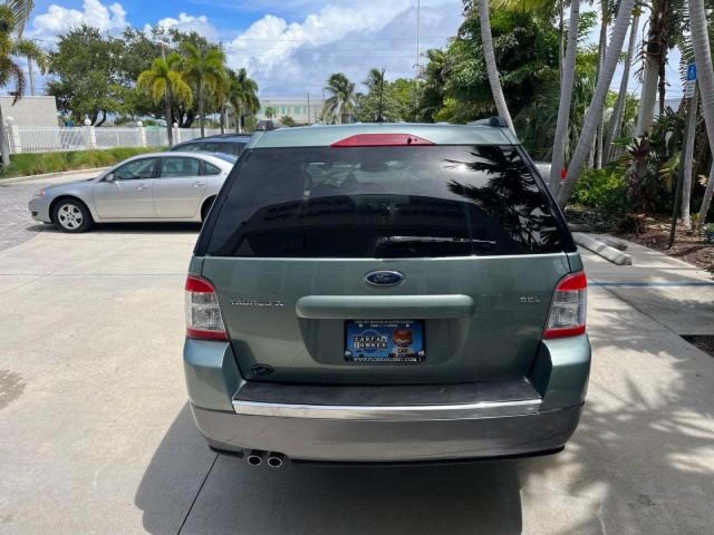 2008 Titanium Green Metallic /Camel Ford Taurus X 1 FL SEL LOW MILES 65,186 3RD ROW (1FMDK02W48G) with an 3.5L SMPI 24-Valve V6 Duratec Engine engine, Automatic transmission, located at 4701 North Dixie Hwy, Pompano Beach, FL, 33064, (954) 422-2889, 26.240938, -80.123474 - OUR WEBPAGE FLORIDACARS1.COM HAS OVER 100 PHOTOS AND FREE CARFAX LINK 2008 FORD TAURUS X SEL ROAD READY 3.5L V6 VIN: 1FMDK02W48GA18867 NO RECALLS 24 MPG 4 DOOR WAGON/SPORT UTILITY 1 OWNER FLORIDA 3.5L V6 F 3 ROW SEATS GASOLINE LOW MILES 65,186 FRONT WHEEL DRIVE POWER SEATS/MIRRORS 9 SERVICE RECORDS - Photo#6