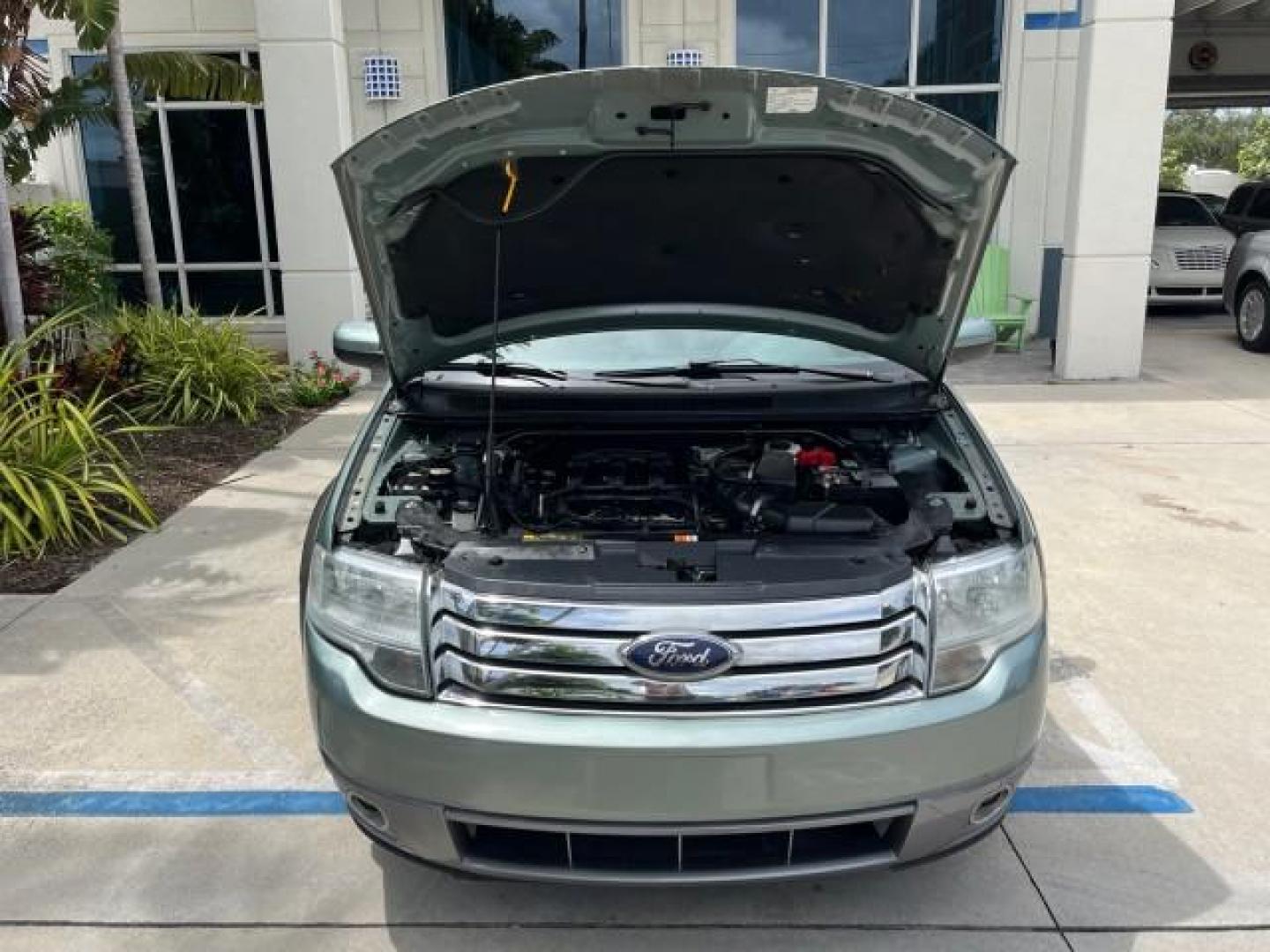 2008 Titanium Green Metallic /Camel Ford Taurus X 1 FL SEL LOW MILES 65,186 3RD ROW (1FMDK02W48G) with an 3.5L SMPI 24-Valve V6 Duratec Engine engine, Automatic transmission, located at 4701 North Dixie Hwy, Pompano Beach, FL, 33064, (954) 422-2889, 26.240938, -80.123474 - OUR WEBPAGE FLORIDACARS1.COM HAS OVER 100 PHOTOS AND FREE CARFAX LINK 2008 FORD TAURUS X SEL ROAD READY 3.5L V6 VIN: 1FMDK02W48GA18867 NO RECALLS 24 MPG 4 DOOR WAGON/SPORT UTILITY 1 OWNER FLORIDA 3.5L V6 F 3 ROW SEATS GASOLINE LOW MILES 65,186 FRONT WHEEL DRIVE POWER SEATS/MIRRORS 9 SERVICE RECORDS - Photo#77