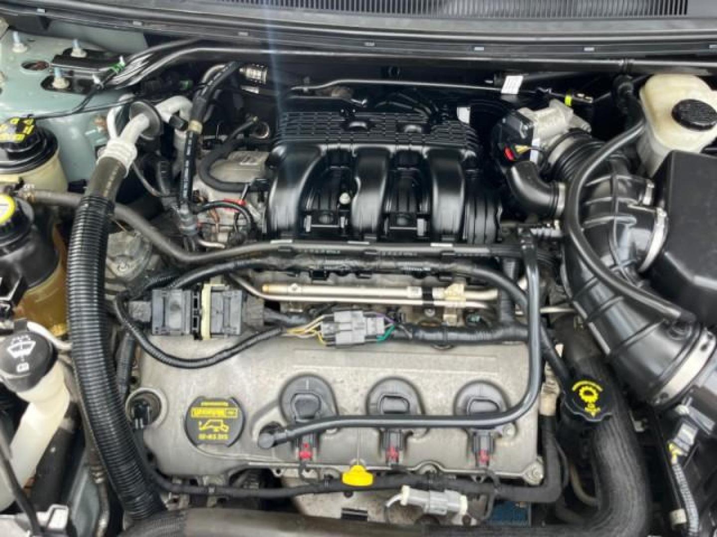 2008 Titanium Green Metallic /Camel Ford Taurus X 1 FL SEL LOW MILES 65,186 3RD ROW (1FMDK02W48G) with an 3.5L SMPI 24-Valve V6 Duratec Engine engine, Automatic transmission, located at 4701 North Dixie Hwy, Pompano Beach, FL, 33064, (954) 422-2889, 26.240938, -80.123474 - OUR WEBPAGE FLORIDACARS1.COM HAS OVER 100 PHOTOS AND FREE CARFAX LINK 2008 FORD TAURUS X SEL ROAD READY 3.5L V6 VIN: 1FMDK02W48GA18867 NO RECALLS 24 MPG 4 DOOR WAGON/SPORT UTILITY 1 OWNER FLORIDA 3.5L V6 F 3 ROW SEATS GASOLINE LOW MILES 65,186 FRONT WHEEL DRIVE POWER SEATS/MIRRORS 9 SERVICE RECORDS - Photo#78