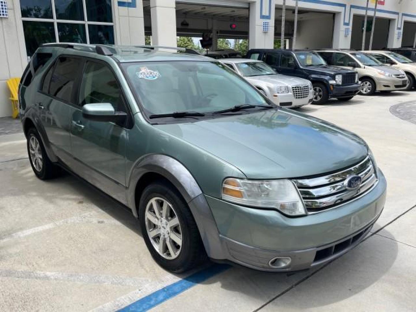 2008 Titanium Green Metallic /Camel Ford Taurus X 1 FL SEL LOW MILES 65,186 3RD ROW (1FMDK02W48G) with an 3.5L SMPI 24-Valve V6 Duratec Engine engine, Automatic transmission, located at 4701 North Dixie Hwy, Pompano Beach, FL, 33064, (954) 422-2889, 26.240938, -80.123474 - OUR WEBPAGE FLORIDACARS1.COM HAS OVER 100 PHOTOS AND FREE CARFAX LINK 2008 FORD TAURUS X SEL ROAD READY 3.5L V6 VIN: 1FMDK02W48GA18867 NO RECALLS 24 MPG 4 DOOR WAGON/SPORT UTILITY 1 OWNER FLORIDA 3.5L V6 F 3 ROW SEATS GASOLINE LOW MILES 65,186 FRONT WHEEL DRIVE POWER SEATS/MIRRORS 9 SERVICE RECORDS - Photo#82