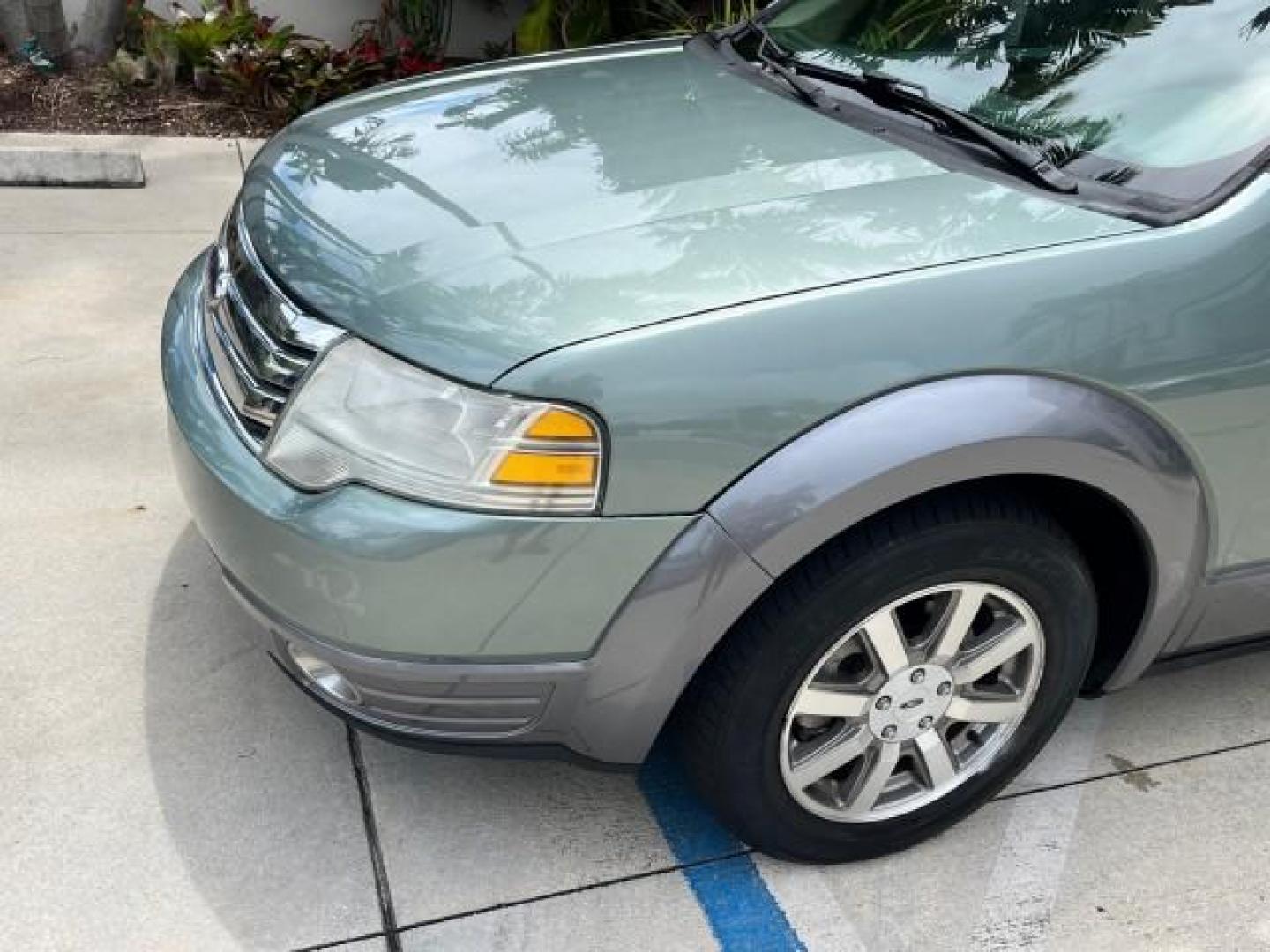 2008 Titanium Green Metallic /Camel Ford Taurus X 1 FL SEL LOW MILES 65,186 3RD ROW (1FMDK02W48G) with an 3.5L SMPI 24-Valve V6 Duratec Engine engine, Automatic transmission, located at 4701 North Dixie Hwy, Pompano Beach, FL, 33064, (954) 422-2889, 26.240938, -80.123474 - OUR WEBPAGE FLORIDACARS1.COM HAS OVER 100 PHOTOS AND FREE CARFAX LINK 2008 FORD TAURUS X SEL ROAD READY 3.5L V6 VIN: 1FMDK02W48GA18867 NO RECALLS 24 MPG 4 DOOR WAGON/SPORT UTILITY 1 OWNER FLORIDA 3.5L V6 F 3 ROW SEATS GASOLINE LOW MILES 65,186 FRONT WHEEL DRIVE POWER SEATS/MIRRORS 9 SERVICE RECORDS - Photo#92