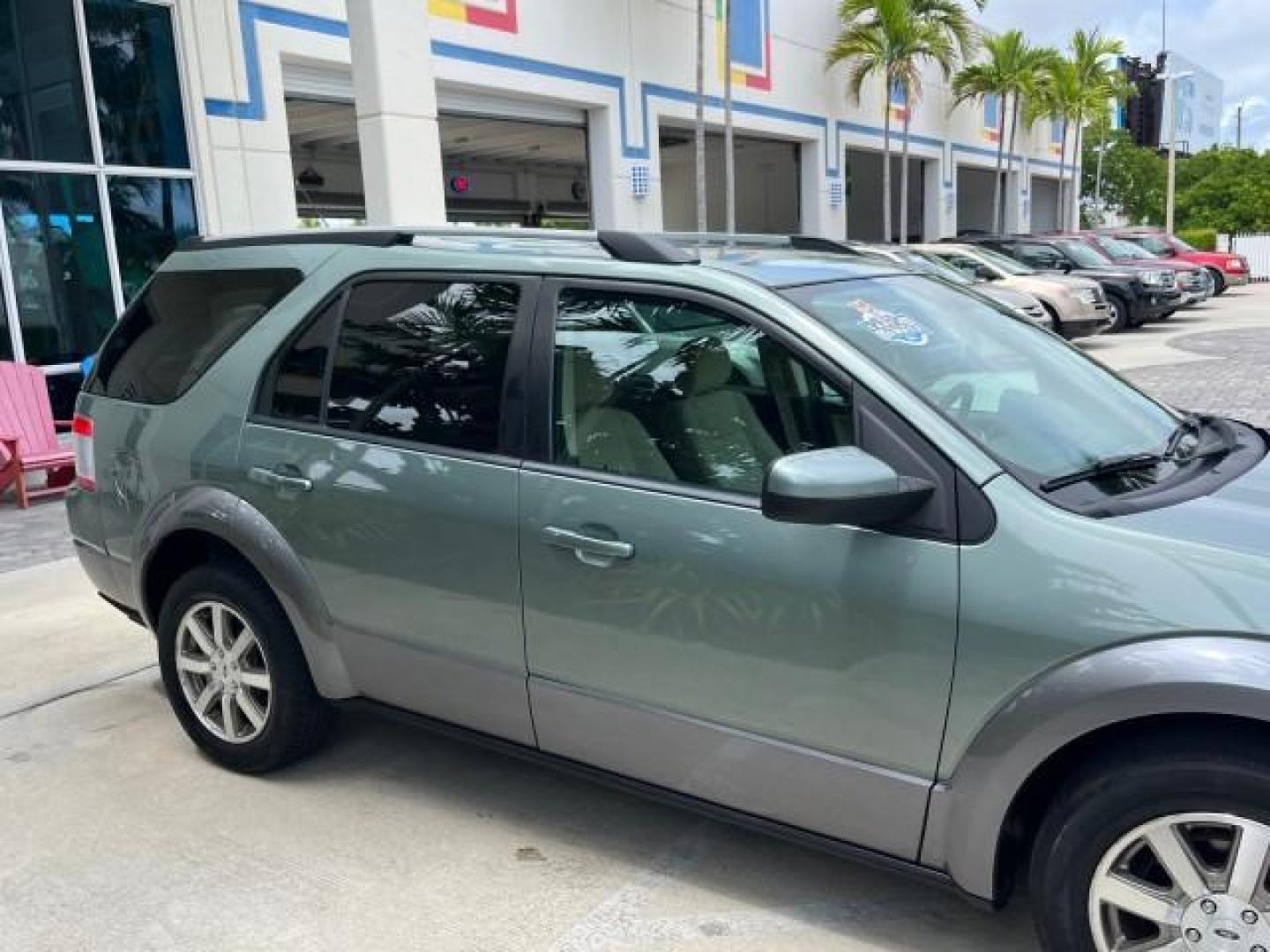 2008 Titanium Green Metallic /Camel Ford Taurus X 1 FL SEL LOW MILES 65,186 3RD ROW (1FMDK02W48G) with an 3.5L SMPI 24-Valve V6 Duratec Engine engine, Automatic transmission, located at 4701 North Dixie Hwy, Pompano Beach, FL, 33064, (954) 422-2889, 26.240938, -80.123474 - OUR WEBPAGE FLORIDACARS1.COM HAS OVER 100 PHOTOS AND FREE CARFAX LINK 2008 FORD TAURUS X SEL ROAD READY 3.5L V6 VIN: 1FMDK02W48GA18867 NO RECALLS 24 MPG 4 DOOR WAGON/SPORT UTILITY 1 OWNER FLORIDA 3.5L V6 F 3 ROW SEATS GASOLINE LOW MILES 65,186 FRONT WHEEL DRIVE POWER SEATS/MIRRORS 9 SERVICE RECORDS - Photo#94