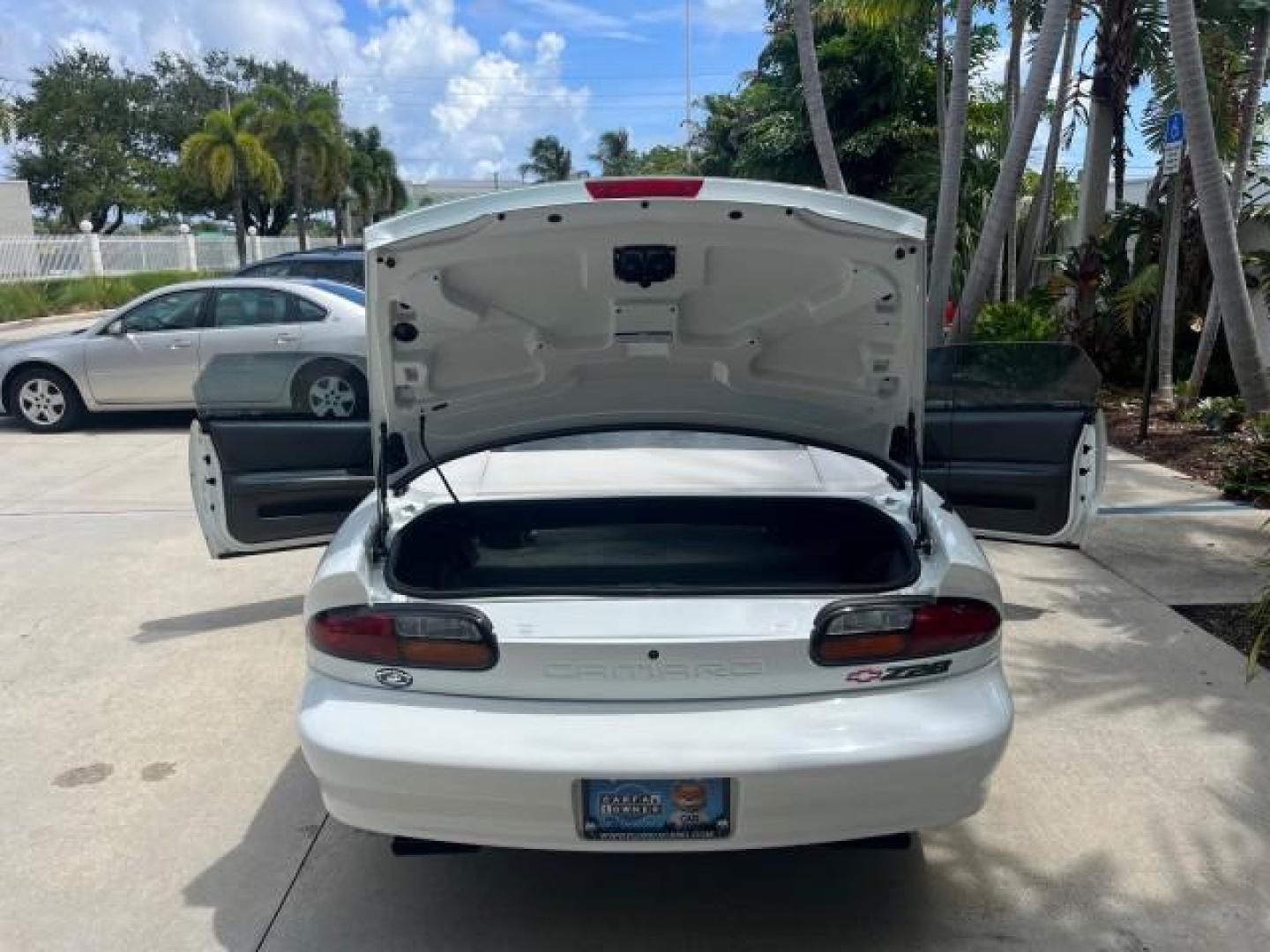 1997 Arctic White /Arctic White Chevrolet Camaro 1 FL Z28 CONV LOW MILES 26,311 (2G1FP32P1V2) with an 5.7L SFI V8 Engine engine, Automatic transmission, located at 4701 North Dixie Hwy, Pompano Beach, FL, 33064, (954) 422-2889, 26.240938, -80.123474 - OUR WEBPAGE FLORIDACARS1.COM HAS OVER 100 PHOTOS AND FREE CARFAX LINK 1997 CHEVROLET CAMARO Z28 ROAD READY 5.7L V8 VIN: 2G1FP32P1V2111351 Z28 NO ACCIDENTS CONVERTIBLE NO RECALLS 27 MPG 5.7L V8 F OHV 16V VERY CLEAN POWER CONVERTIBLE TOP GASOLINE LOW MILES 26,311 REAR WHEEL DRIVE 1 OWNER FLORIDA POWER - Photo#15