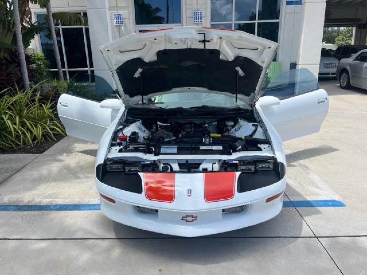 1997 Arctic White /Arctic White Chevrolet Camaro 1 FL Z28 CONV LOW MILES 26,311 (2G1FP32P1V2) with an 5.7L SFI V8 Engine engine, Automatic transmission, located at 4701 North Dixie Hwy, Pompano Beach, FL, 33064, (954) 422-2889, 26.240938, -80.123474 - OUR WEBPAGE FLORIDACARS1.COM HAS OVER 100 PHOTOS AND FREE CARFAX LINK 1997 CHEVROLET CAMARO Z28 ROAD READY 5.7L V8 VIN: 2G1FP32P1V2111351 Z28 NO ACCIDENTS CONVERTIBLE NO RECALLS 27 MPG 5.7L V8 F OHV 16V VERY CLEAN POWER CONVERTIBLE TOP GASOLINE LOW MILES 26,311 REAR WHEEL DRIVE 1 OWNER FLORIDA POWER - Photo#16