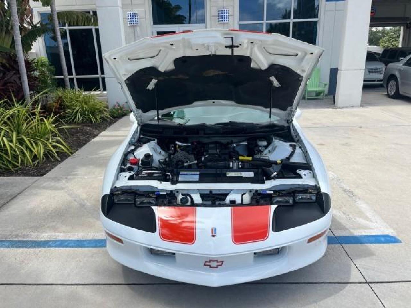 1997 Arctic White /Arctic White Chevrolet Camaro 1 FL Z28 CONV LOW MILES 26,311 (2G1FP32P1V2) with an 5.7L SFI V8 Engine engine, Automatic transmission, located at 4701 North Dixie Hwy, Pompano Beach, FL, 33064, (954) 422-2889, 26.240938, -80.123474 - OUR WEBPAGE FLORIDACARS1.COM HAS OVER 100 PHOTOS AND FREE CARFAX LINK 1997 CHEVROLET CAMARO Z28 ROAD READY 5.7L V8 VIN: 2G1FP32P1V2111351 Z28 NO ACCIDENTS CONVERTIBLE NO RECALLS 27 MPG 5.7L V8 F OHV 16V VERY CLEAN POWER CONVERTIBLE TOP GASOLINE LOW MILES 26,311 REAR WHEEL DRIVE 1 OWNER FLORIDA POWER - Photo#59