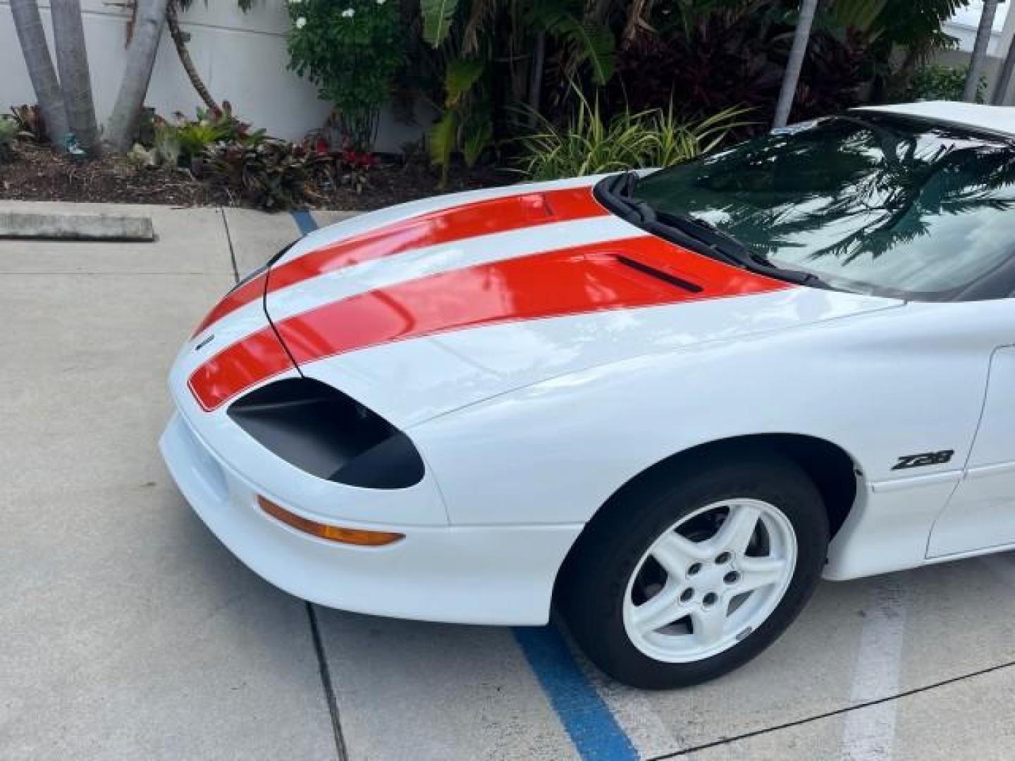 1997 Arctic White /Arctic White Chevrolet Camaro 1 FL Z28 CONV LOW MILES 26,311 (2G1FP32P1V2) with an 5.7L SFI V8 Engine engine, Automatic transmission, located at 4701 North Dixie Hwy, Pompano Beach, FL, 33064, (954) 422-2889, 26.240938, -80.123474 - OUR WEBPAGE FLORIDACARS1.COM HAS OVER 100 PHOTOS AND FREE CARFAX LINK 1997 CHEVROLET CAMARO Z28 ROAD READY 5.7L V8 VIN: 2G1FP32P1V2111351 Z28 NO ACCIDENTS CONVERTIBLE NO RECALLS 27 MPG 5.7L V8 F OHV 16V VERY CLEAN POWER CONVERTIBLE TOP GASOLINE LOW MILES 26,311 REAR WHEEL DRIVE 1 OWNER FLORIDA POWER - Photo#76