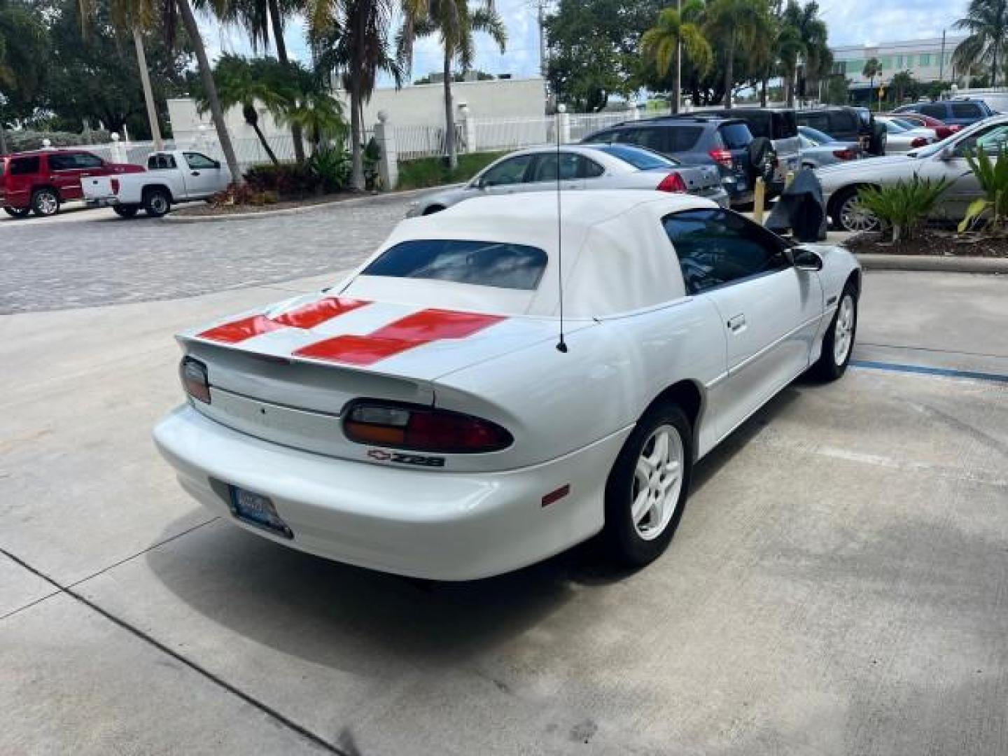 1997 Arctic White /Arctic White Chevrolet Camaro 1 FL Z28 CONV LOW MILES 26,311 (2G1FP32P1V2) with an 5.7L SFI V8 Engine engine, Automatic transmission, located at 4701 North Dixie Hwy, Pompano Beach, FL, 33064, (954) 422-2889, 26.240938, -80.123474 - OUR WEBPAGE FLORIDACARS1.COM HAS OVER 100 PHOTOS AND FREE CARFAX LINK 1997 CHEVROLET CAMARO Z28 ROAD READY 5.7L V8 VIN: 2G1FP32P1V2111351 Z28 NO ACCIDENTS CONVERTIBLE NO RECALLS 27 MPG 5.7L V8 F OHV 16V VERY CLEAN POWER CONVERTIBLE TOP GASOLINE LOW MILES 26,311 REAR WHEEL DRIVE 1 OWNER FLORIDA POWER - Photo#7