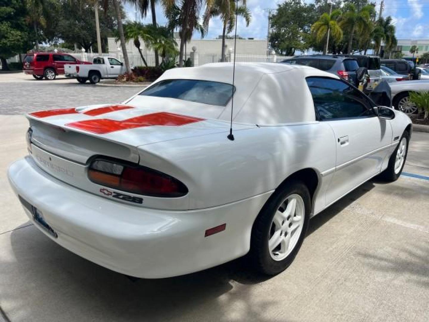 1997 Arctic White /Arctic White Chevrolet Camaro 1 FL Z28 CONV LOW MILES 26,311 (2G1FP32P1V2) with an 5.7L SFI V8 Engine engine, Automatic transmission, located at 4701 North Dixie Hwy, Pompano Beach, FL, 33064, (954) 422-2889, 26.240938, -80.123474 - OUR WEBPAGE FLORIDACARS1.COM HAS OVER 100 PHOTOS AND FREE CARFAX LINK 1997 CHEVROLET CAMARO Z28 ROAD READY 5.7L V8 VIN: 2G1FP32P1V2111351 Z28 NO ACCIDENTS CONVERTIBLE NO RECALLS 27 MPG 5.7L V8 F OHV 16V VERY CLEAN POWER CONVERTIBLE TOP GASOLINE LOW MILES 26,311 REAR WHEEL DRIVE 1 OWNER FLORIDA POWER - Photo#94