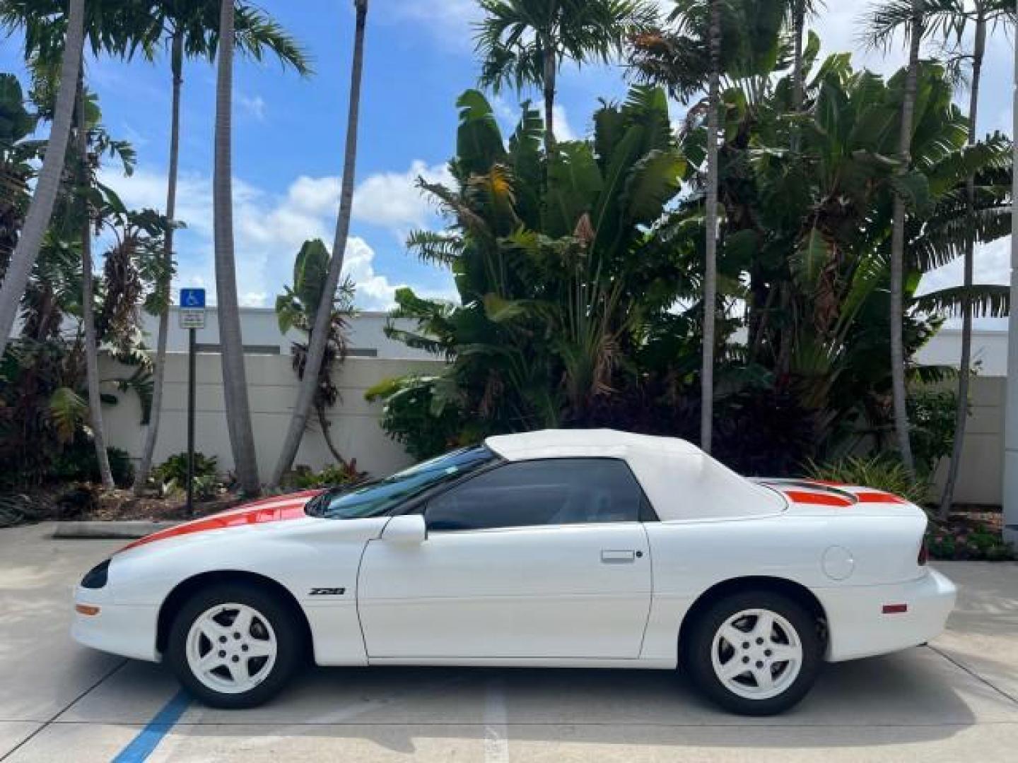 1997 Arctic White /Arctic White Chevrolet Camaro 1 FL Z28 CONV LOW MILES 26,311 (2G1FP32P1V2) with an 5.7L SFI V8 Engine engine, Automatic transmission, located at 4701 North Dixie Hwy, Pompano Beach, FL, 33064, (954) 422-2889, 26.240938, -80.123474 - OUR WEBPAGE FLORIDACARS1.COM HAS OVER 100 PHOTOS AND FREE CARFAX LINK 1997 CHEVROLET CAMARO Z28 ROAD READY 5.7L V8 VIN: 2G1FP32P1V2111351 Z28 NO ACCIDENTS CONVERTIBLE NO RECALLS 27 MPG 5.7L V8 F OHV 16V VERY CLEAN POWER CONVERTIBLE TOP GASOLINE LOW MILES 26,311 REAR WHEEL DRIVE 1 OWNER FLORIDA POWER - Photo#98