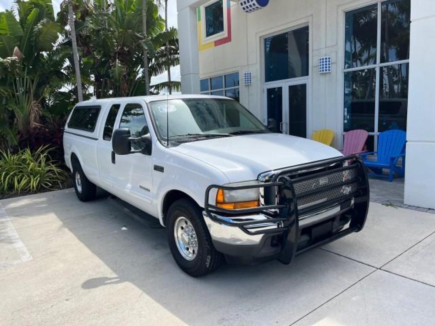 2001 Oxford White /Medium Parchment Ford Super Duty F-250 Lariat LOW MILES 71,725 (3FTNX20F21M) with an 7.3L DI V8 Turbo-Diesel Power Stroke Engine engine, Automatic transmission, located at 4701 North Dixie Hwy, Pompano Beach, FL, 33064, (954) 422-2889, 26.240938, -80.123474 - OUR WEBPAGE FLORIDACARS1.COM HAS OVER 100 PHOTOS AND FREE CARFAX LINK 2001 FORD F-250 SUPER DUTY LARIAT ROAD READY WORK READY VIN: 3FTNX20F21MA60359 NO ACCIDENTS NO RECALLS 4 DOOR EXTENDED CAB PICKUP 7.3L V8 TURBO DIESEL 7.3L V8 F LOW MILES 71,725 DIESEL POWER SEATS 8.2 FT BED REAR WHEEL DRIVE 18 SE - Photo#1