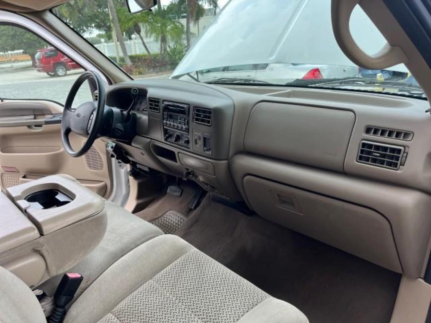 2001 Oxford White /Medium Parchment Ford Super Duty F-250 Lariat LOW MILES 71,725 (3FTNX20F21M) with an 7.3L DI V8 Turbo-Diesel Power Stroke Engine engine, Automatic transmission, located at 4701 North Dixie Hwy, Pompano Beach, FL, 33064, (954) 422-2889, 26.240938, -80.123474 - OUR WEBPAGE FLORIDACARS1.COM HAS OVER 100 PHOTOS AND FREE CARFAX LINK 2001 FORD F-250 SUPER DUTY LARIAT ROAD READY WORK READY VIN: 3FTNX20F21MA60359 NO ACCIDENTS NO RECALLS 4 DOOR EXTENDED CAB PICKUP 7.3L V8 TURBO DIESEL 7.3L V8 F LOW MILES 71,725 DIESEL POWER SEATS 8.2 FT BED REAR WHEEL DRIVE 18 SE - Photo#27