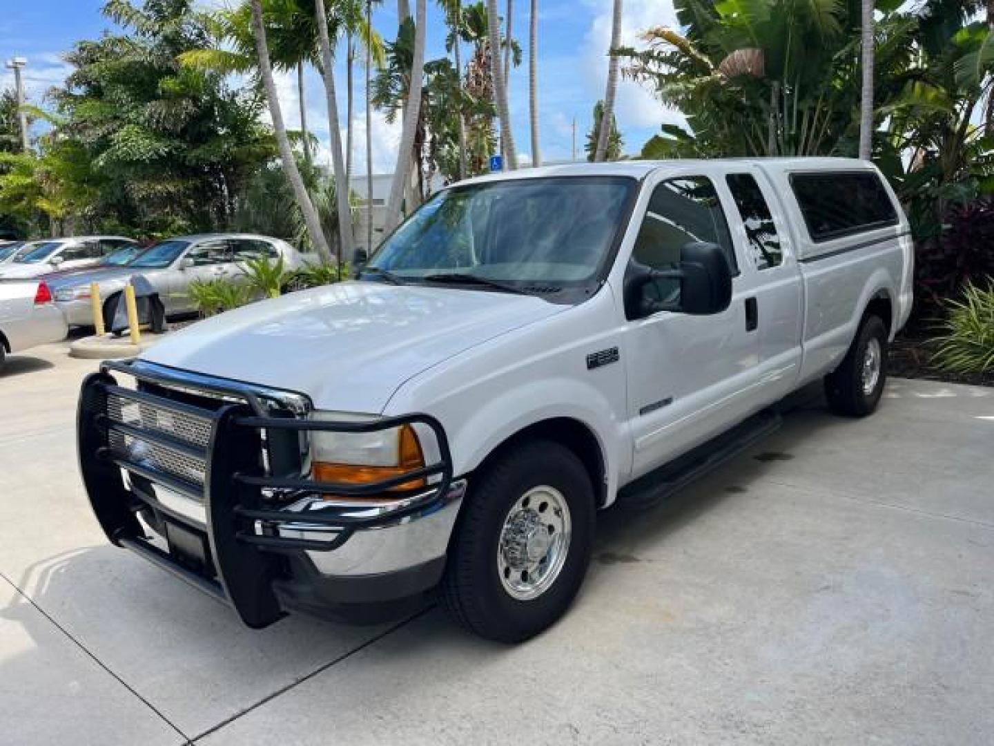 2001 Oxford White /Medium Parchment Ford Super Duty F-250 Lariat LOW MILES 71,725 (3FTNX20F21M) with an 7.3L DI V8 Turbo-Diesel Power Stroke Engine engine, Automatic transmission, located at 4701 North Dixie Hwy, Pompano Beach, FL, 33064, (954) 422-2889, 26.240938, -80.123474 - OUR WEBPAGE FLORIDACARS1.COM HAS OVER 100 PHOTOS AND FREE CARFAX LINK 2001 FORD F-250 SUPER DUTY LARIAT ROAD READY WORK READY VIN: 3FTNX20F21MA60359 NO ACCIDENTS NO RECALLS 4 DOOR EXTENDED CAB PICKUP 7.3L V8 TURBO DIESEL 7.3L V8 F LOW MILES 71,725 DIESEL POWER SEATS 8.2 FT BED REAR WHEEL DRIVE 18 SE - Photo#3