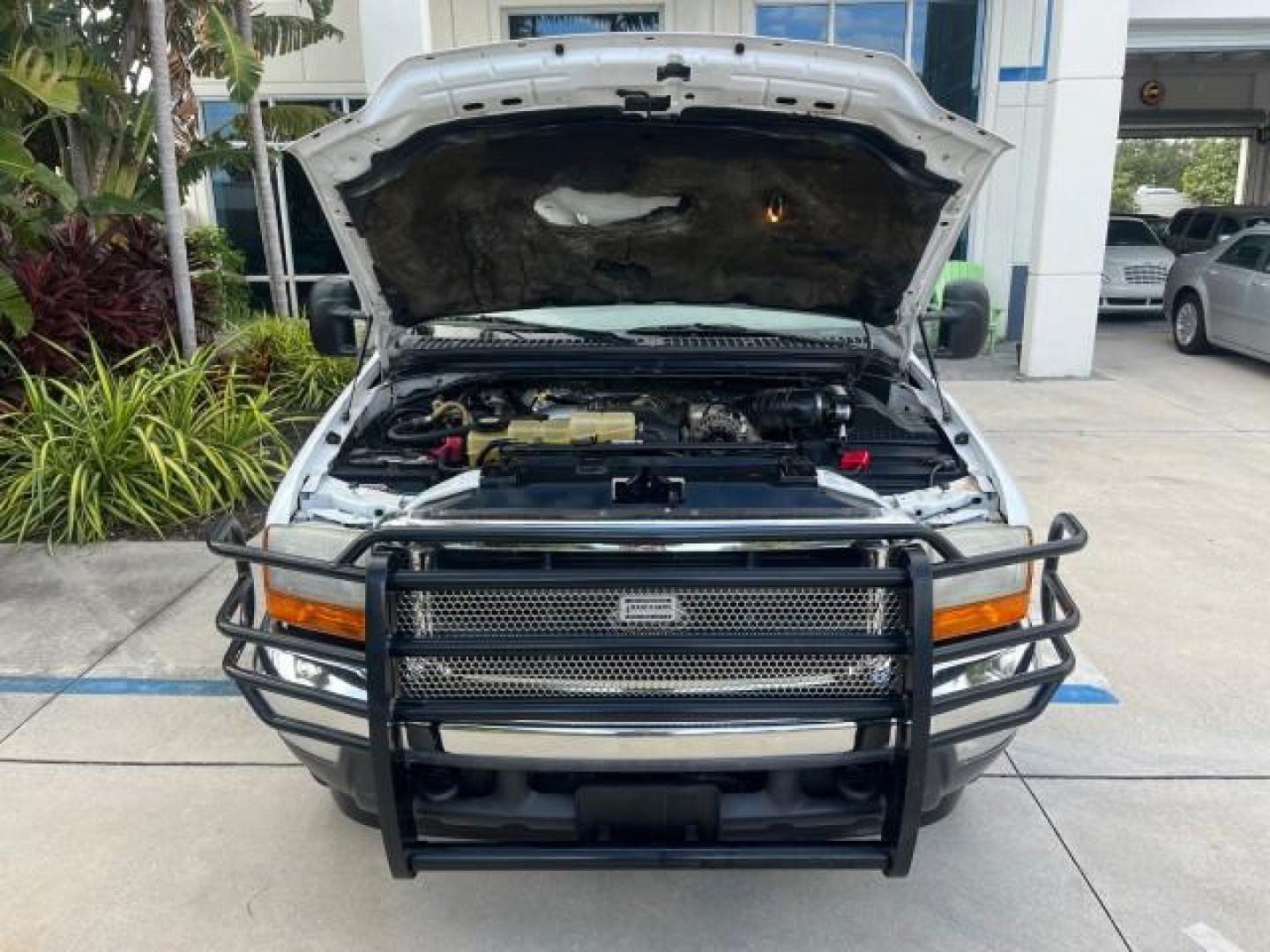 2001 Oxford White /Medium Parchment Ford Super Duty F-250 Lariat LOW MILES 71,725 (3FTNX20F21M) with an 7.3L DI V8 Turbo-Diesel Power Stroke Engine engine, Automatic transmission, located at 4701 North Dixie Hwy, Pompano Beach, FL, 33064, (954) 422-2889, 26.240938, -80.123474 - OUR WEBPAGE FLORIDACARS1.COM HAS OVER 100 PHOTOS AND FREE CARFAX LINK 2001 FORD F-250 SUPER DUTY LARIAT ROAD READY WORK READY VIN: 3FTNX20F21MA60359 NO ACCIDENTS NO RECALLS 4 DOOR EXTENDED CAB PICKUP 7.3L V8 TURBO DIESEL 7.3L V8 F LOW MILES 71,725 DIESEL POWER SEATS 8.2 FT BED REAR WHEEL DRIVE 18 SE - Photo#58