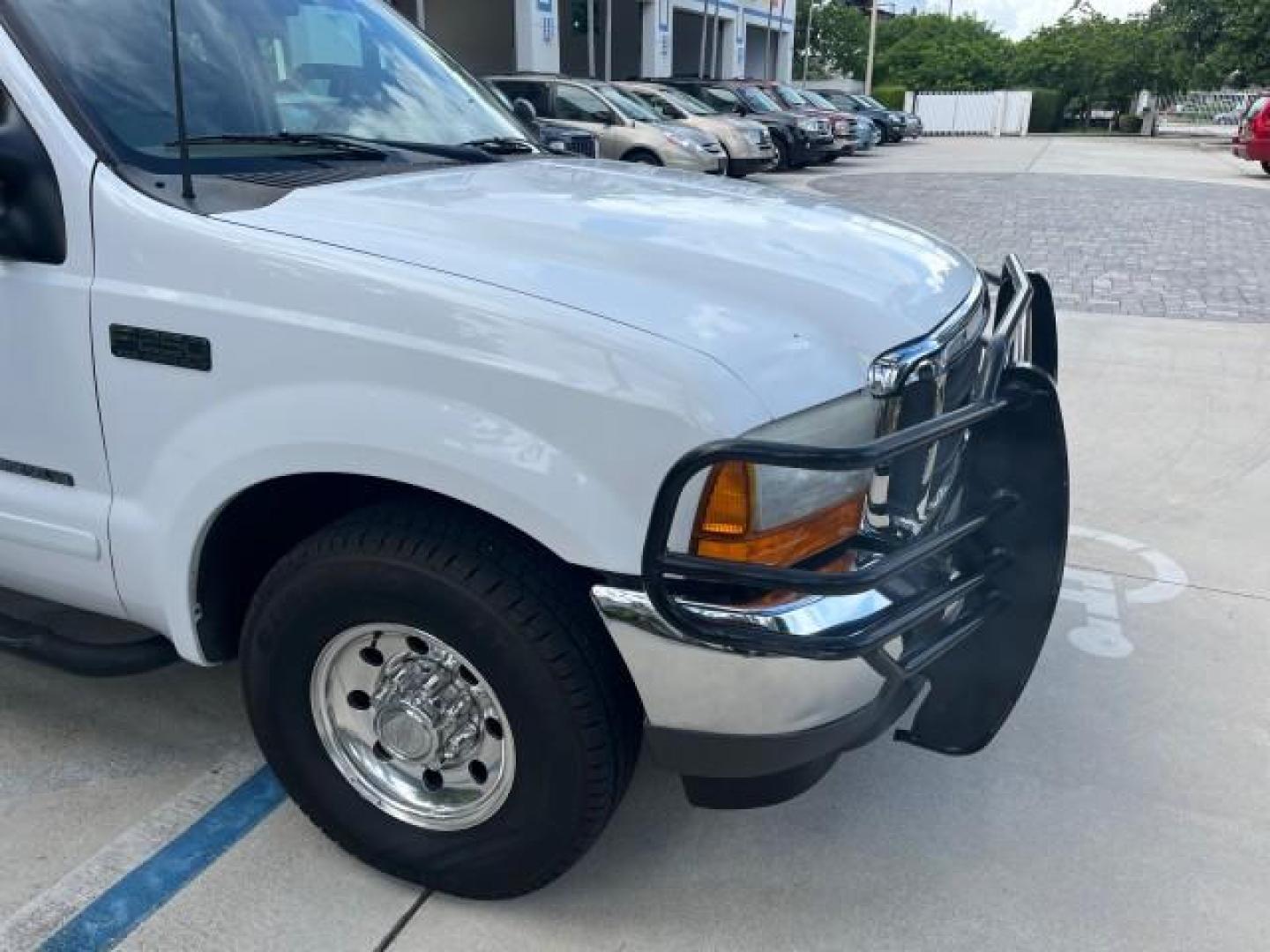 2001 Oxford White /Medium Parchment Ford Super Duty F-250 Lariat LOW MILES 71,725 (3FTNX20F21M) with an 7.3L DI V8 Turbo-Diesel Power Stroke Engine engine, Automatic transmission, located at 4701 North Dixie Hwy, Pompano Beach, FL, 33064, (954) 422-2889, 26.240938, -80.123474 - OUR WEBPAGE FLORIDACARS1.COM HAS OVER 100 PHOTOS AND FREE CARFAX LINK 2001 FORD F-250 SUPER DUTY LARIAT ROAD READY WORK READY VIN: 3FTNX20F21MA60359 NO ACCIDENTS NO RECALLS 4 DOOR EXTENDED CAB PICKUP 7.3L V8 TURBO DIESEL 7.3L V8 F LOW MILES 71,725 DIESEL POWER SEATS 8.2 FT BED REAR WHEEL DRIVE 18 SE - Photo#72