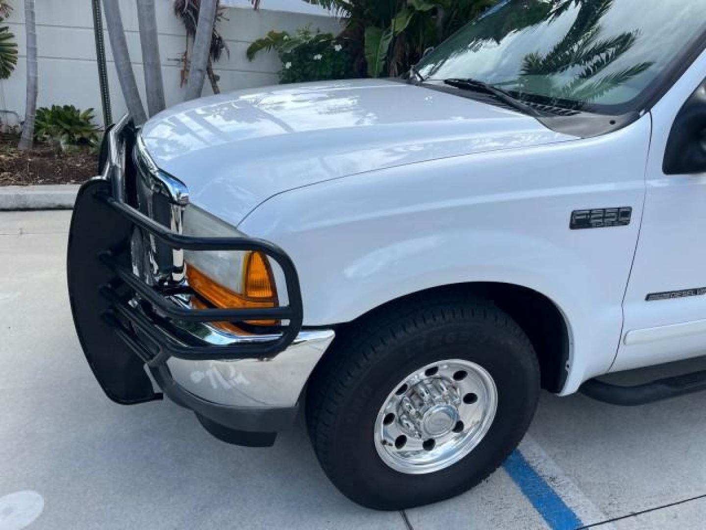 2001 Oxford White /Medium Parchment Ford Super Duty F-250 Lariat LOW MILES 71,725 (3FTNX20F21M) with an 7.3L DI V8 Turbo-Diesel Power Stroke Engine engine, Automatic transmission, located at 4701 North Dixie Hwy, Pompano Beach, FL, 33064, (954) 422-2889, 26.240938, -80.123474 - OUR WEBPAGE FLORIDACARS1.COM HAS OVER 100 PHOTOS AND FREE CARFAX LINK 2001 FORD F-250 SUPER DUTY LARIAT ROAD READY WORK READY VIN: 3FTNX20F21MA60359 NO ACCIDENTS NO RECALLS 4 DOOR EXTENDED CAB PICKUP 7.3L V8 TURBO DIESEL 7.3L V8 F LOW MILES 71,725 DIESEL POWER SEATS 8.2 FT BED REAR WHEEL DRIVE 18 SE - Photo#73