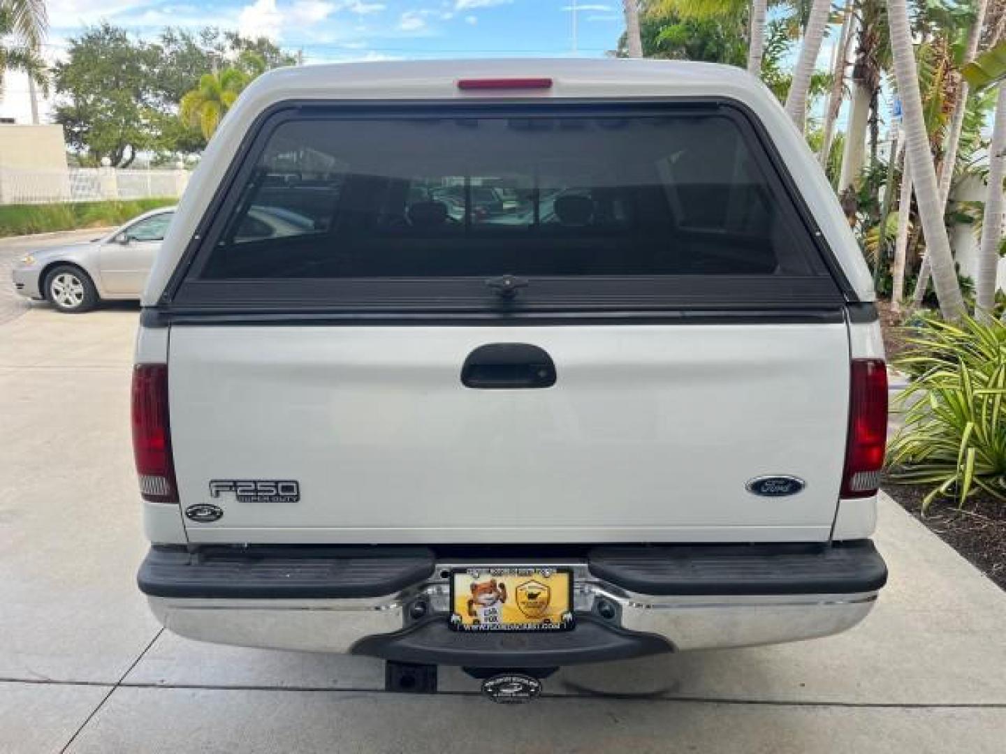 2001 Oxford White /Medium Parchment Ford Super Duty F-250 Lariat LOW MILES 71,725 (3FTNX20F21M) with an 7.3L DI V8 Turbo-Diesel Power Stroke Engine engine, Automatic transmission, located at 4701 North Dixie Hwy, Pompano Beach, FL, 33064, (954) 422-2889, 26.240938, -80.123474 - OUR WEBPAGE FLORIDACARS1.COM HAS OVER 100 PHOTOS AND FREE CARFAX LINK 2001 FORD F-250 SUPER DUTY LARIAT ROAD READY WORK READY VIN: 3FTNX20F21MA60359 NO ACCIDENTS NO RECALLS 4 DOOR EXTENDED CAB PICKUP 7.3L V8 TURBO DIESEL 7.3L V8 F LOW MILES 71,725 DIESEL POWER SEATS 8.2 FT BED REAR WHEEL DRIVE 18 SE - Photo#96