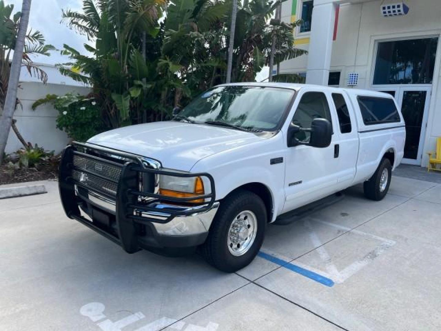 2001 Oxford White /Medium Parchment Ford Super Duty F-250 Lariat LOW MILES 71,725 (3FTNX20F21M) with an 7.3L DI V8 Turbo-Diesel Power Stroke Engine engine, Automatic transmission, located at 4701 North Dixie Hwy, Pompano Beach, FL, 33064, (954) 422-2889, 26.240938, -80.123474 - OUR WEBPAGE FLORIDACARS1.COM HAS OVER 100 PHOTOS AND FREE CARFAX LINK 2001 FORD F-250 SUPER DUTY LARIAT ROAD READY WORK READY VIN: 3FTNX20F21MA60359 NO ACCIDENTS NO RECALLS 4 DOOR EXTENDED CAB PICKUP 7.3L V8 TURBO DIESEL 7.3L V8 F LOW MILES 71,725 DIESEL POWER SEATS 8.2 FT BED REAR WHEEL DRIVE 18 SE - Photo#98