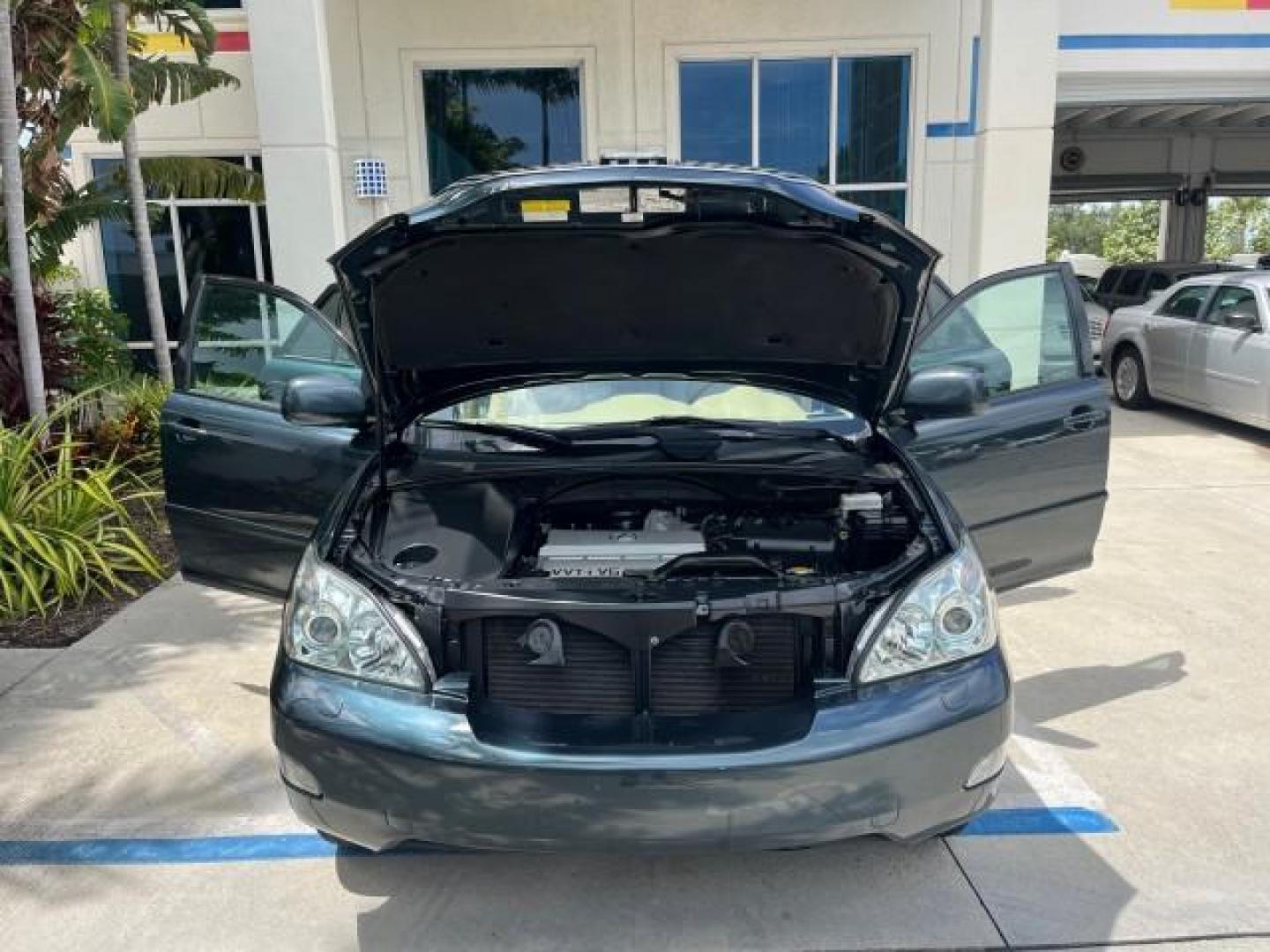 2005 Millennium Silver Metallic /Ivory Lexus RX 330 AWD LOW MILES 58,057 (2T2HA31U15C) with an 3.3L DOHC MPI 24-Valve V6 Engine engine, Automatic transmission, located at 4701 North Dixie Hwy, Pompano Beach, FL, 33064, (954) 422-2889, 26.240938, -80.123474 - OUR WEBPAGE FLORIDACARS1.COM HAS OVER 100 PHOTOS AND FREE CARFAX LINK 2005 LEXUS RX 330 ROAD READY 3.3L V6 VIN: 2T2HA31U15C061157 NO ACCIDENTS AWD 4 DOOR WAGON/SPORT UTILITY NO RECALLS 3.3L V6 F 24V POWER LIFTGATE POWER LEATHER SEATS GASOLINE AWD POWER SUNROOF ALL WHEEL DRIVE LOW MILES 58,057 32 SER - Photo#16