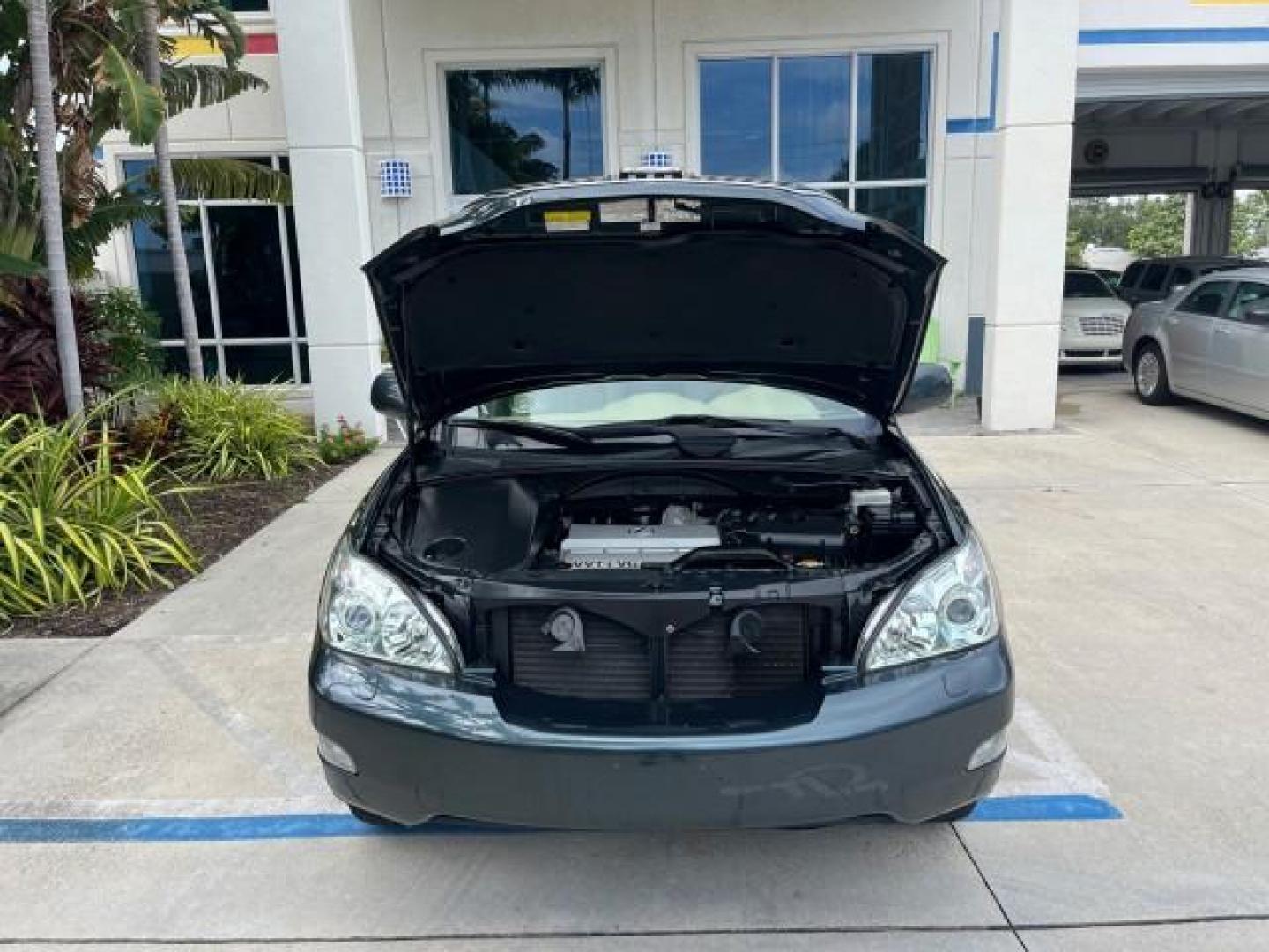 2005 Millennium Silver Metallic /Ivory Lexus RX 330 AWD LOW MILES 58,057 (2T2HA31U15C) with an 3.3L DOHC MPI 24-Valve V6 Engine engine, Automatic transmission, located at 4701 North Dixie Hwy, Pompano Beach, FL, 33064, (954) 422-2889, 26.240938, -80.123474 - OUR WEBPAGE FLORIDACARS1.COM HAS OVER 100 PHOTOS AND FREE CARFAX LINK 2005 LEXUS RX 330 ROAD READY 3.3L V6 VIN: 2T2HA31U15C061157 NO ACCIDENTS AWD 4 DOOR WAGON/SPORT UTILITY NO RECALLS 3.3L V6 F 24V POWER LIFTGATE POWER LEATHER SEATS GASOLINE AWD POWER SUNROOF ALL WHEEL DRIVE LOW MILES 58,057 32 SER - Photo#72