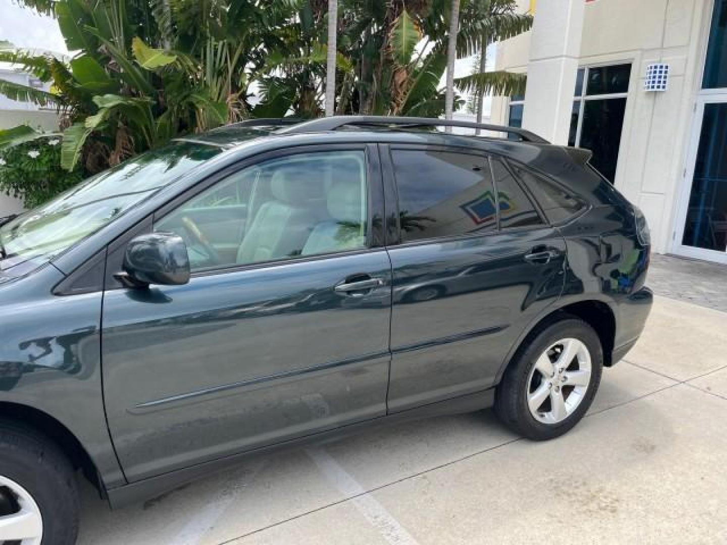 2005 Millennium Silver Metallic /Ivory Lexus RX 330 AWD LOW MILES 58,057 (2T2HA31U15C) with an 3.3L DOHC MPI 24-Valve V6 Engine engine, Automatic transmission, located at 4701 North Dixie Hwy, Pompano Beach, FL, 33064, (954) 422-2889, 26.240938, -80.123474 - OUR WEBPAGE FLORIDACARS1.COM HAS OVER 100 PHOTOS AND FREE CARFAX LINK 2005 LEXUS RX 330 ROAD READY 3.3L V6 VIN: 2T2HA31U15C061157 NO ACCIDENTS AWD 4 DOOR WAGON/SPORT UTILITY NO RECALLS 3.3L V6 F 24V POWER LIFTGATE POWER LEATHER SEATS GASOLINE AWD POWER SUNROOF ALL WHEEL DRIVE LOW MILES 58,057 32 SER - Photo#88