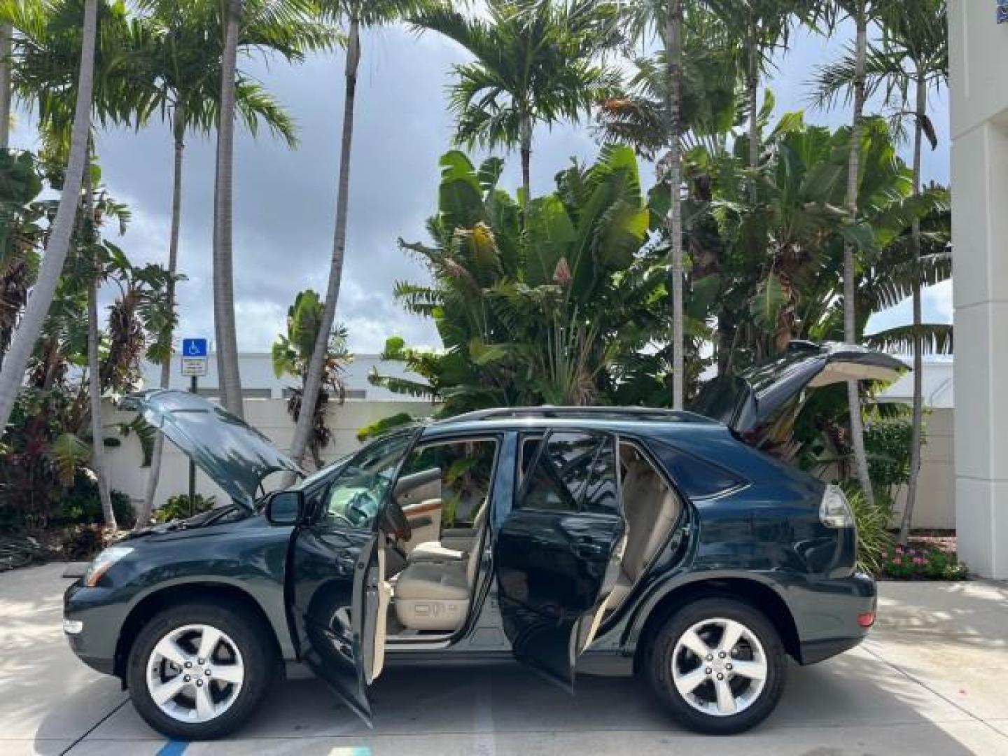 2005 Millennium Silver Metallic /Ivory Lexus RX 330 AWD LOW MILES 58,057 (2T2HA31U15C) with an 3.3L DOHC MPI 24-Valve V6 Engine engine, Automatic transmission, located at 4701 North Dixie Hwy, Pompano Beach, FL, 33064, (954) 422-2889, 26.240938, -80.123474 - OUR WEBPAGE FLORIDACARS1.COM HAS OVER 100 PHOTOS AND FREE CARFAX LINK 2005 LEXUS RX 330 ROAD READY 3.3L V6 VIN: 2T2HA31U15C061157 NO ACCIDENTS AWD 4 DOOR WAGON/SPORT UTILITY NO RECALLS 3.3L V6 F 24V POWER LIFTGATE POWER LEATHER SEATS GASOLINE AWD POWER SUNROOF ALL WHEEL DRIVE LOW MILES 58,057 32 SER - Photo#8