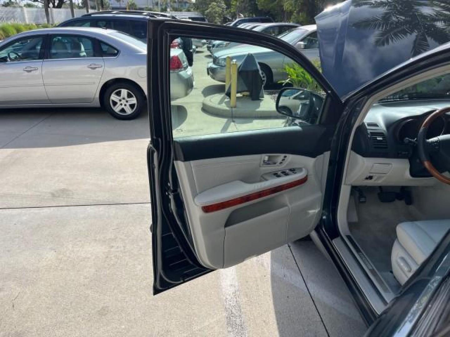 2007 Flint Mica /Light Gray Lexus RX 350 NAV LOW MILES 35,598 (2T2GK31U17C) with an 3.5L DOHC SMPI 24-Valve V6 Engine engine, Automatic transmission, located at 4701 North Dixie Hwy, Pompano Beach, FL, 33064, (954) 422-2889, 26.240938, -80.123474 - OUR WEBPAGE FLORIDACARS1.COM HAS OVER 100 PHOTOS AND FREE CARFAX LINK 2007 LEXUS RX 350 NEW $48,231 ROAD READY VIN: 2T2GK31U17C019745 NO ACCIDENTS NO RECALLS 4 DOOR WAGON/SPORT UTILITY LOW MILES 35,598 3.5L V6 3.5L V6 F DOHC 24V POWER LEATHER SEATS DUAL AC GASOLINE POWER SUNROOF/LIFTGATE FRONT WHEEL - Photo#9