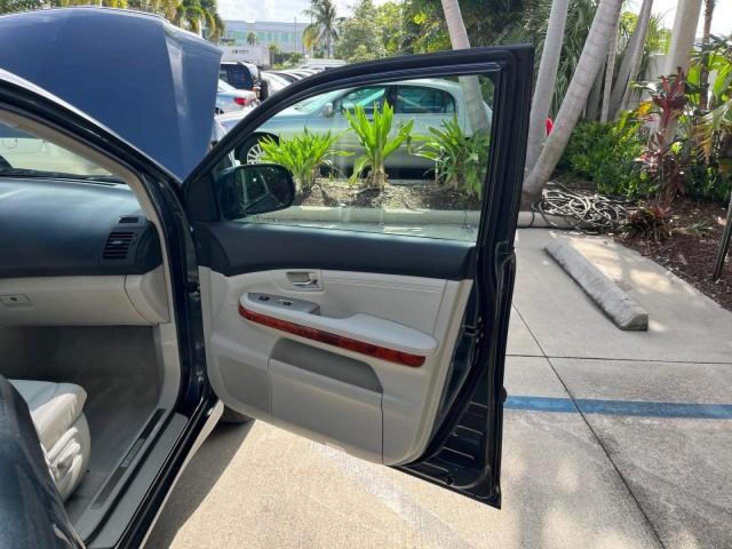 2007 Flint Mica /Light Gray Lexus RX 350 NAV LOW MILES 35,598 (2T2GK31U17C) with an 3.5L DOHC SMPI 24-Valve V6 Engine engine, Automatic transmission, located at 4701 North Dixie Hwy, Pompano Beach, FL, 33064, (954) 422-2889, 26.240938, -80.123474 - OUR WEBPAGE FLORIDACARS1.COM HAS OVER 100 PHOTOS AND FREE CARFAX LINK 2007 LEXUS RX 350 NEW $48,231 ROAD READY VIN: 2T2GK31U17C019745 NO ACCIDENTS NO RECALLS 4 DOOR WAGON/SPORT UTILITY LOW MILES 35,598 3.5L V6 3.5L V6 F DOHC 24V POWER LEATHER SEATS DUAL AC GASOLINE POWER SUNROOF/LIFTGATE FRONT WHEEL - Photo#11