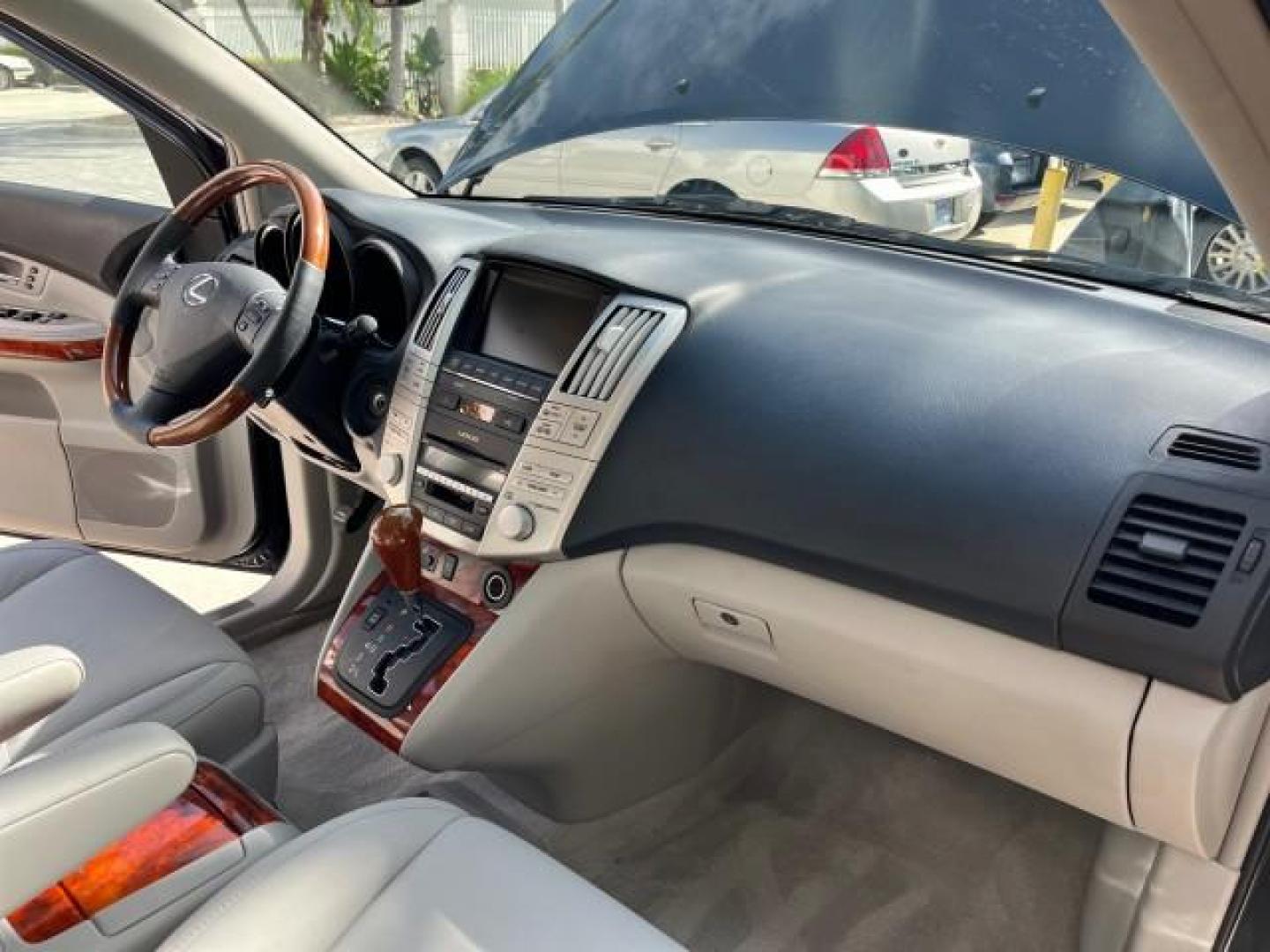 2007 Flint Mica /Light Gray Lexus RX 350 NAV LOW MILES 35,598 (2T2GK31U17C) with an 3.5L DOHC SMPI 24-Valve V6 Engine engine, Automatic transmission, located at 4701 North Dixie Hwy, Pompano Beach, FL, 33064, (954) 422-2889, 26.240938, -80.123474 - OUR WEBPAGE FLORIDACARS1.COM HAS OVER 100 PHOTOS AND FREE CARFAX LINK 2007 LEXUS RX 350 NEW $48,231 ROAD READY VIN: 2T2GK31U17C019745 NO ACCIDENTS NO RECALLS 4 DOOR WAGON/SPORT UTILITY LOW MILES 35,598 3.5L V6 3.5L V6 F DOHC 24V POWER LEATHER SEATS DUAL AC GASOLINE POWER SUNROOF/LIFTGATE FRONT WHEEL - Photo#29