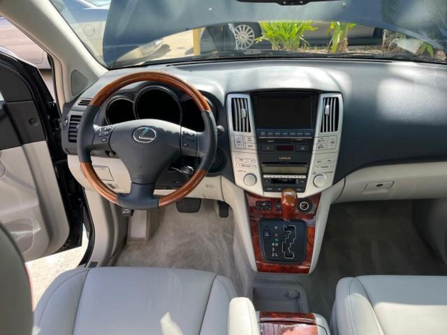 2007 Flint Mica /Light Gray Lexus RX 350 NAV LOW MILES 35,598 (2T2GK31U17C) with an 3.5L DOHC SMPI 24-Valve V6 Engine engine, Automatic transmission, located at 4701 North Dixie Hwy, Pompano Beach, FL, 33064, (954) 422-2889, 26.240938, -80.123474 - OUR WEBPAGE FLORIDACARS1.COM HAS OVER 100 PHOTOS AND FREE CARFAX LINK 2007 LEXUS RX 350 NEW $48,231 ROAD READY VIN: 2T2GK31U17C019745 NO ACCIDENTS NO RECALLS 4 DOOR WAGON/SPORT UTILITY LOW MILES 35,598 3.5L V6 3.5L V6 F DOHC 24V POWER LEATHER SEATS DUAL AC GASOLINE POWER SUNROOF/LIFTGATE FRONT WHEEL - Photo#38