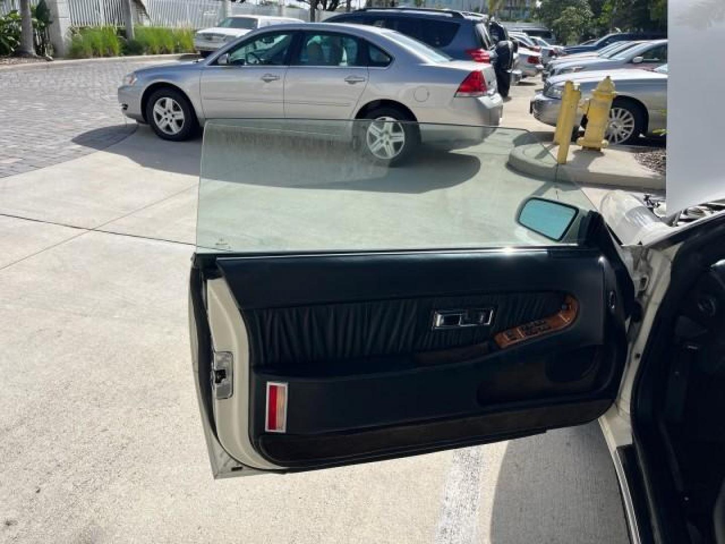 1991 WHITE /BLACK Chrysler TC HARD TOP LOW MILES 34,790 (ZC2FS1203MB) with an 3.0L V6 Cylinder Engine engine, Automatic transmission, located at 4701 North Dixie Hwy, Pompano Beach, FL, 33064, (954) 422-2889, 26.240938, -80.123474 - OUR WEBPAGE FLORIDACARS1.COM HAS OVER 100 PHOTOS AND FREE CARFAX LINK 1991 CHRYSLER TC ROAD READY 3.0L V6 VIN: ZC2FS1203MB207381 NO ACCIDENTS CONVERTIBLE NO RECALLS 3.0L V6 F FLORIDA OWNER GASOLINE POWER MIRRORS LOW MILES 34,790 FRONT WHEEL DRIVE CONVERTIBLE SOFT TOP / HARD TOP POWER LEATHER SEATS A - Photo#12