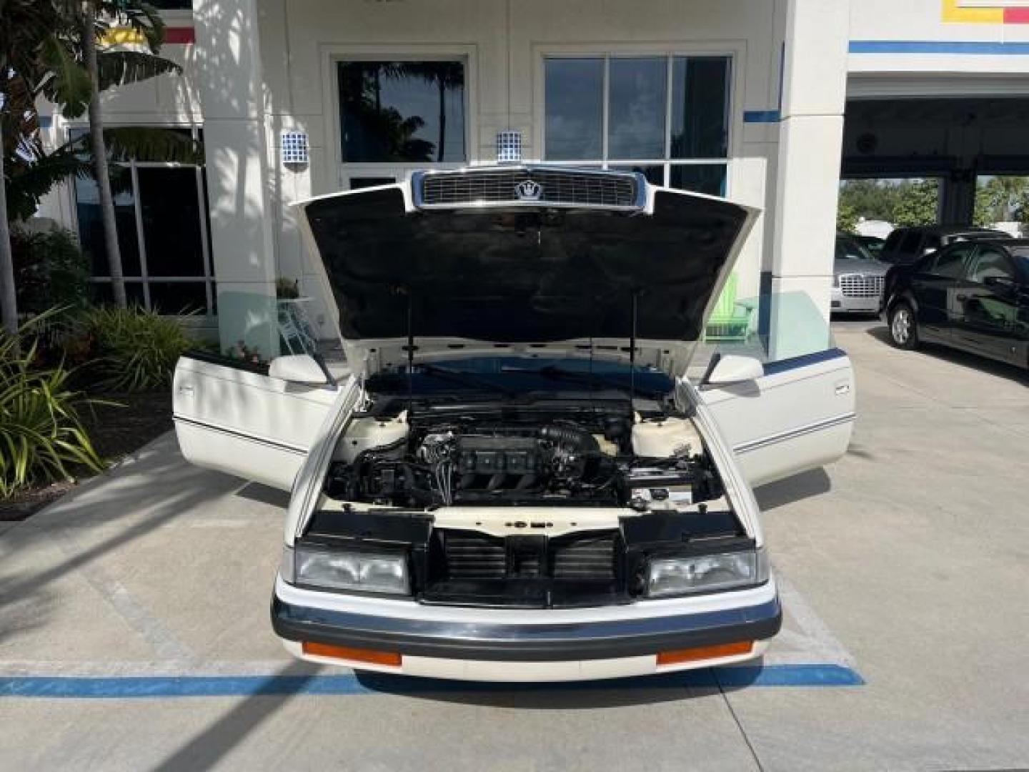 1991 WHITE /BLACK Chrysler TC HARD TOP LOW MILES 34,790 (ZC2FS1203MB) with an 3.0L V6 Cylinder Engine engine, Automatic transmission, located at 4701 North Dixie Hwy, Pompano Beach, FL, 33064, (954) 422-2889, 26.240938, -80.123474 - OUR WEBPAGE FLORIDACARS1.COM HAS OVER 100 PHOTOS AND FREE CARFAX LINK 1991 CHRYSLER TC ROAD READY 3.0L V6 VIN: ZC2FS1203MB207381 NO ACCIDENTS CONVERTIBLE NO RECALLS 3.0L V6 F FLORIDA OWNER GASOLINE POWER MIRRORS LOW MILES 34,790 FRONT WHEEL DRIVE CONVERTIBLE SOFT TOP / HARD TOP POWER LEATHER SEATS A - Photo#24