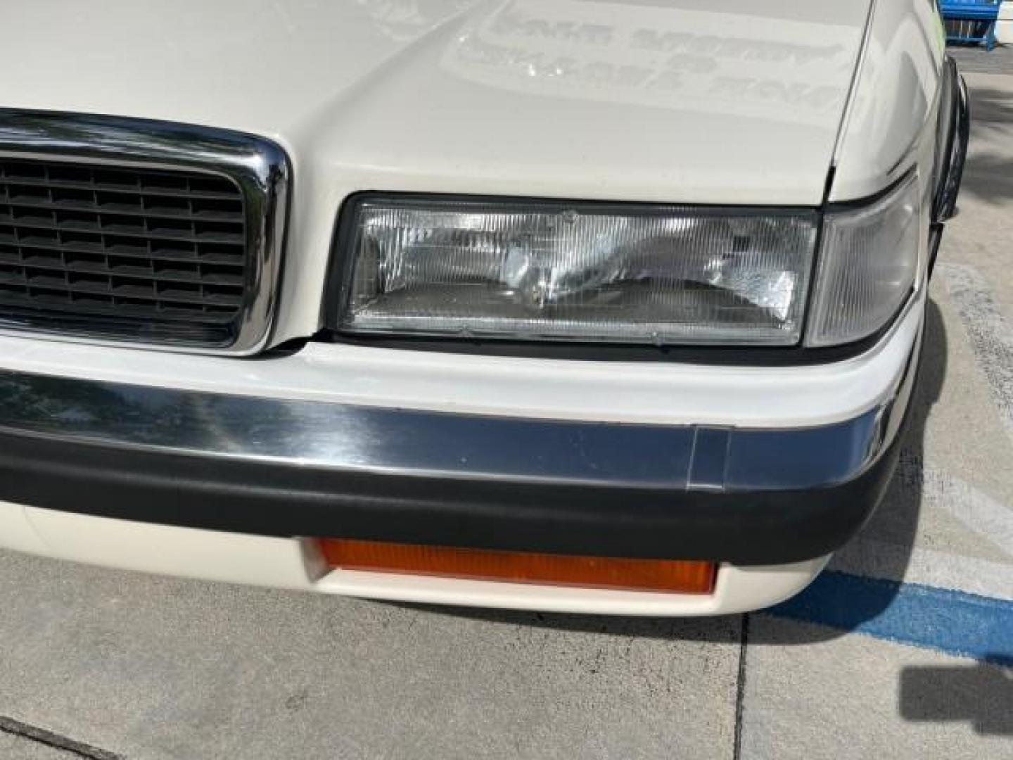 1991 WHITE /BLACK Chrysler TC HARD TOP LOW MILES 34,790 (ZC2FS1203MB) with an 3.0L V6 Cylinder Engine engine, Automatic transmission, located at 4701 North Dixie Hwy, Pompano Beach, FL, 33064, (954) 422-2889, 26.240938, -80.123474 - OUR WEBPAGE FLORIDACARS1.COM HAS OVER 100 PHOTOS AND FREE CARFAX LINK 1991 CHRYSLER TC ROAD READY 3.0L V6 VIN: ZC2FS1203MB207381 NO ACCIDENTS CONVERTIBLE NO RECALLS 3.0L V6 F FLORIDA OWNER GASOLINE POWER MIRRORS LOW MILES 34,790 FRONT WHEEL DRIVE CONVERTIBLE SOFT TOP / HARD TOP POWER LEATHER SEATS A - Photo#64