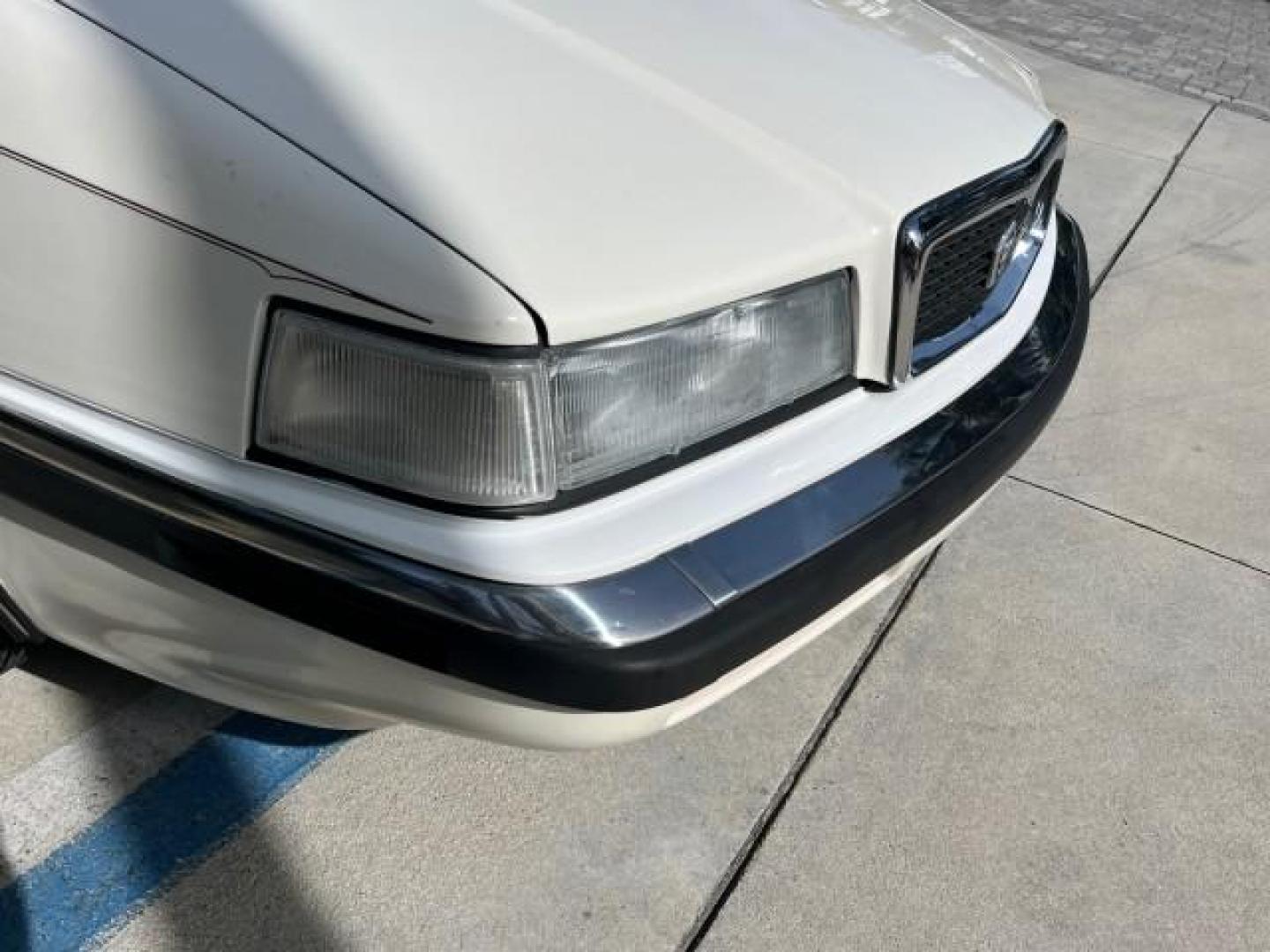 1991 WHITE /BLACK Chrysler TC HARD TOP LOW MILES 34,790 (ZC2FS1203MB) with an 3.0L V6 Cylinder Engine engine, Automatic transmission, located at 4701 North Dixie Hwy, Pompano Beach, FL, 33064, (954) 422-2889, 26.240938, -80.123474 - OUR WEBPAGE FLORIDACARS1.COM HAS OVER 100 PHOTOS AND FREE CARFAX LINK 1991 CHRYSLER TC ROAD READY 3.0L V6 VIN: ZC2FS1203MB207381 NO ACCIDENTS CONVERTIBLE NO RECALLS 3.0L V6 F FLORIDA OWNER GASOLINE POWER MIRRORS LOW MILES 34,790 FRONT WHEEL DRIVE CONVERTIBLE SOFT TOP / HARD TOP POWER LEATHER SEATS A - Photo#68