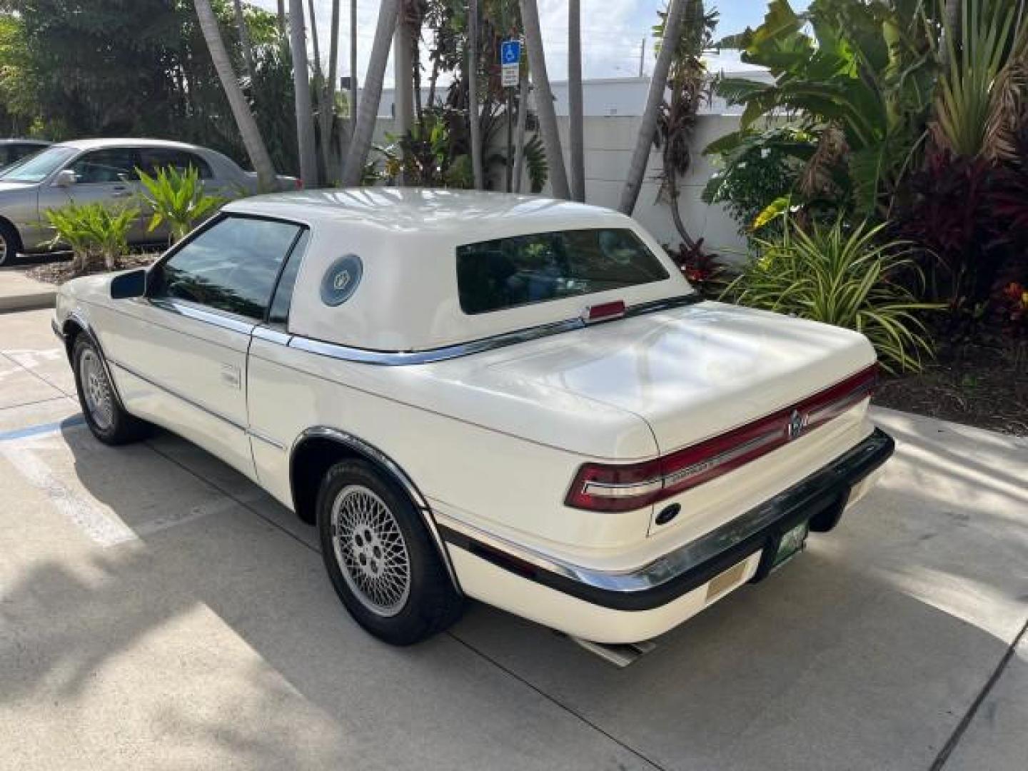 1991 WHITE /BLACK Chrysler TC HARD TOP LOW MILES 34,790 (ZC2FS1203MB) with an 3.0L V6 Cylinder Engine engine, Automatic transmission, located at 4701 North Dixie Hwy, Pompano Beach, FL, 33064, (954) 422-2889, 26.240938, -80.123474 - OUR WEBPAGE FLORIDACARS1.COM HAS OVER 100 PHOTOS AND FREE CARFAX LINK 1991 CHRYSLER TC ROAD READY 3.0L V6 VIN: ZC2FS1203MB207381 NO ACCIDENTS CONVERTIBLE NO RECALLS 3.0L V6 F FLORIDA OWNER GASOLINE POWER MIRRORS LOW MILES 34,790 FRONT WHEEL DRIVE CONVERTIBLE SOFT TOP / HARD TOP POWER LEATHER SEATS A - Photo#83