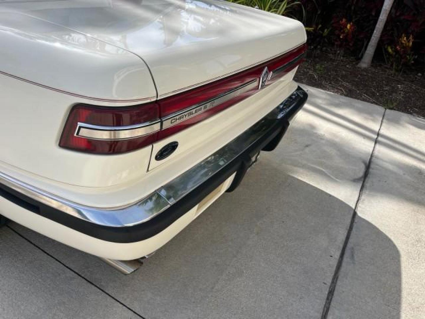 1991 WHITE /BLACK Chrysler TC HARD TOP LOW MILES 34,790 (ZC2FS1203MB) with an 3.0L V6 Cylinder Engine engine, Automatic transmission, located at 4701 North Dixie Hwy, Pompano Beach, FL, 33064, (954) 422-2889, 26.240938, -80.123474 - OUR WEBPAGE FLORIDACARS1.COM HAS OVER 100 PHOTOS AND FREE CARFAX LINK 1991 CHRYSLER TC ROAD READY 3.0L V6 VIN: ZC2FS1203MB207381 NO ACCIDENTS CONVERTIBLE NO RECALLS 3.0L V6 F FLORIDA OWNER GASOLINE POWER MIRRORS LOW MILES 34,790 FRONT WHEEL DRIVE CONVERTIBLE SOFT TOP / HARD TOP POWER LEATHER SEATS A - Photo#91