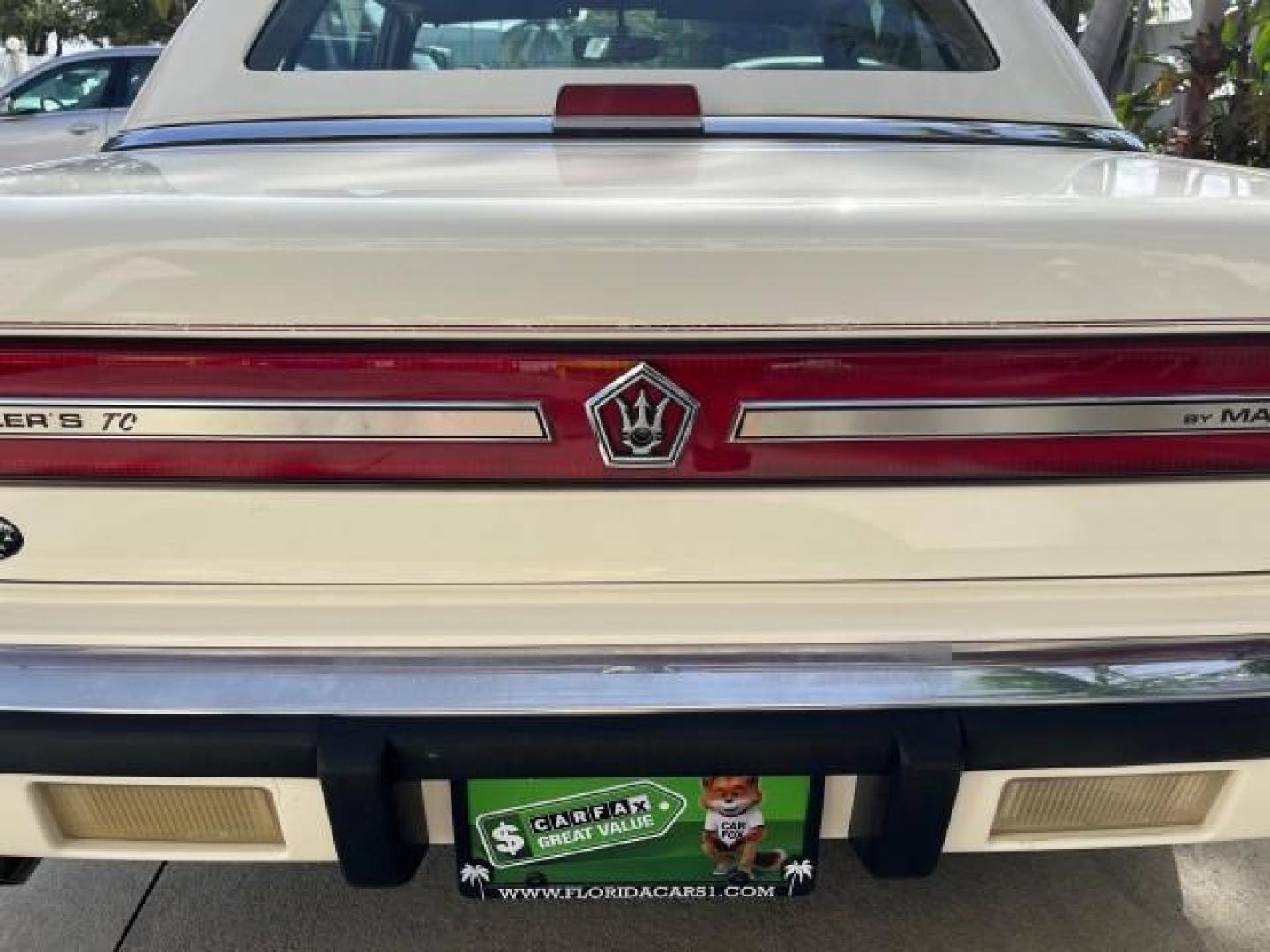 1991 WHITE /BLACK Chrysler TC HARD TOP LOW MILES 34,790 (ZC2FS1203MB) with an 3.0L V6 Cylinder Engine engine, Automatic transmission, located at 4701 North Dixie Hwy, Pompano Beach, FL, 33064, (954) 422-2889, 26.240938, -80.123474 - OUR WEBPAGE FLORIDACARS1.COM HAS OVER 100 PHOTOS AND FREE CARFAX LINK 1991 CHRYSLER TC ROAD READY 3.0L V6 VIN: ZC2FS1203MB207381 NO ACCIDENTS CONVERTIBLE NO RECALLS 3.0L V6 F FLORIDA OWNER GASOLINE POWER MIRRORS LOW MILES 34,790 FRONT WHEEL DRIVE CONVERTIBLE SOFT TOP / HARD TOP POWER LEATHER SEATS A - Photo#96