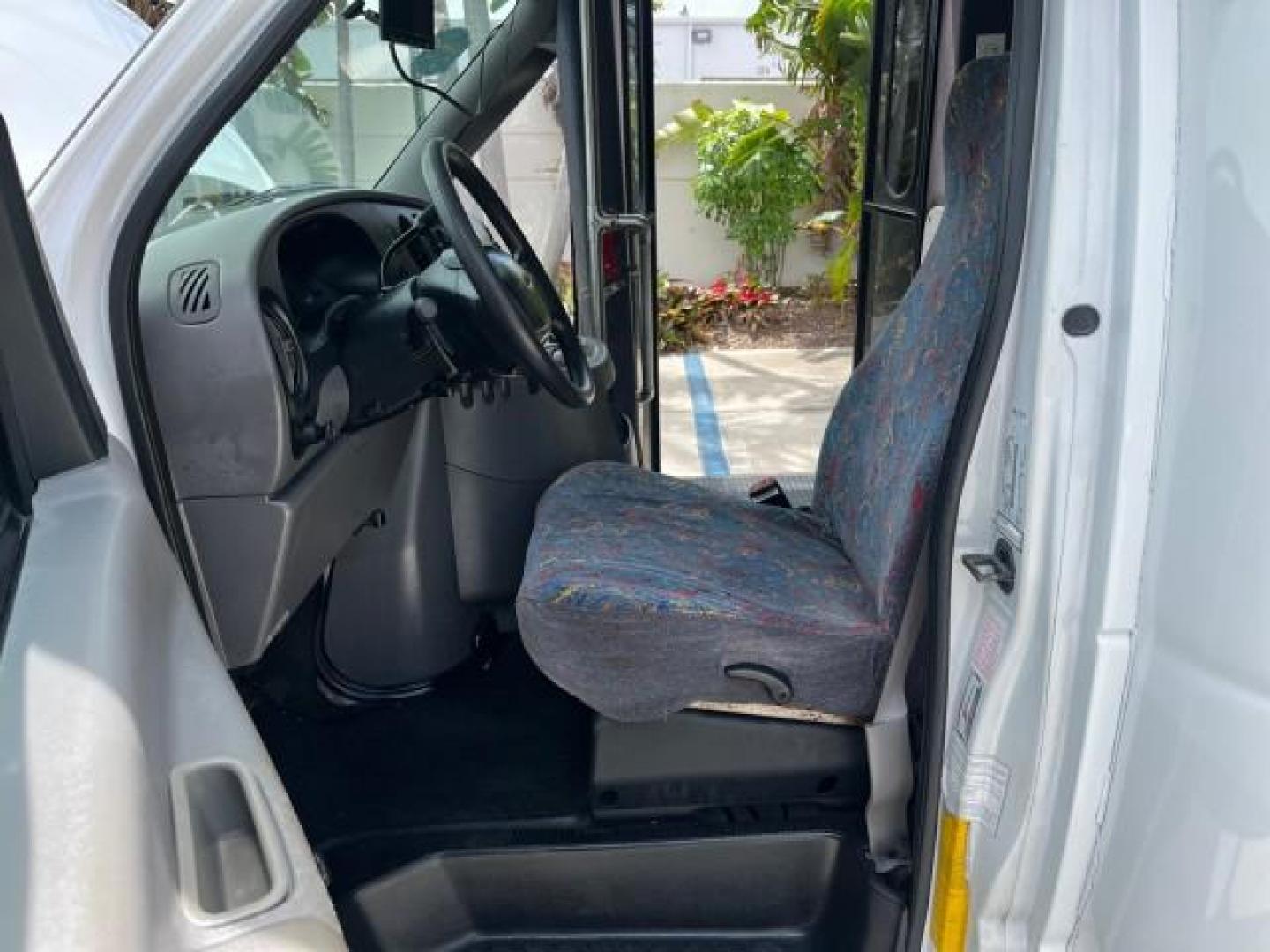 2002 Oxford White /Medium Graphite Ford Econoline Commercial Cutaway DUAL AC UNITS GENERATOR (1FDXE45S12H) with an 6.8L SOHC SEFI V10 Engine engine, Automatic transmission, located at 4701 North Dixie Hwy, Pompano Beach, FL, 33064, (954) 422-2889, 26.240938, -80.123474 - OUR WEBPAGE FLORIDACARS1.COM HAS OVER 100 PHOTOS AND FREE CARFAX LINK 2002 FORD ECONOLINE SUPER DUTY VAN ROAD READY WORK READY VIN: 1FDXE45S12HA08142 LOW MILES 84,809 CUTAWAY NO RECALLS 6.8L V10 6.8L V10 F SOHC FLORIDA OWNER GASOLINE 46 SERVICE RECORDS REAR WHEEL DRIVE DUALLY PUSH START GENERATOR 2 - Photo#10