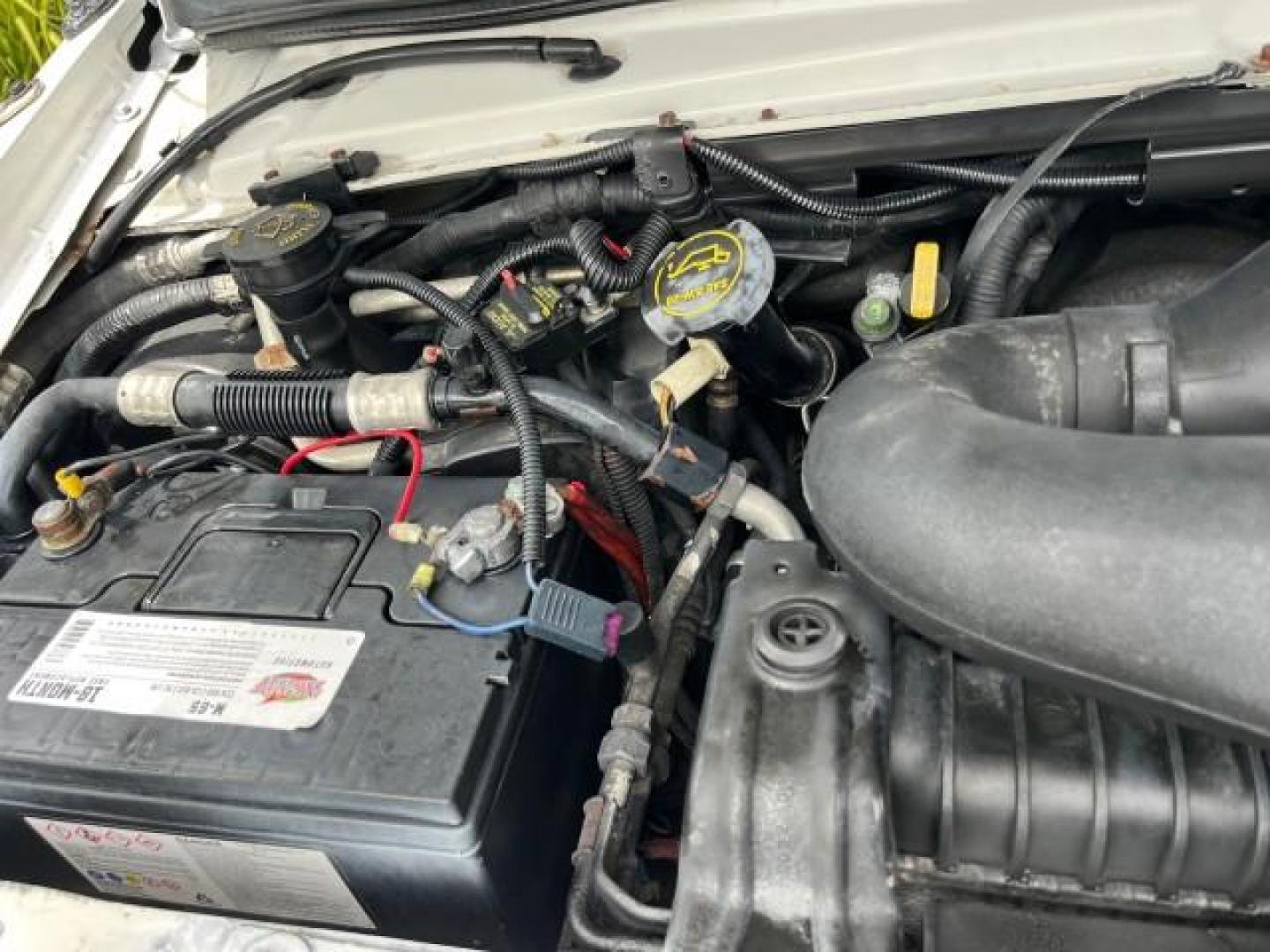 2002 Oxford White /Medium Graphite Ford Econoline Commercial Cutaway DUAL AC UNITS GENERATOR (1FDXE45S12H) with an 6.8L SOHC SEFI V10 Engine engine, Automatic transmission, located at 4701 North Dixie Hwy, Pompano Beach, FL, 33064, (954) 422-2889, 26.240938, -80.123474 - OUR WEBPAGE FLORIDACARS1.COM HAS OVER 100 PHOTOS AND FREE CARFAX LINK 2002 FORD ECONOLINE SUPER DUTY VAN ROAD READY WORK READY VIN: 1FDXE45S12HA08142 LOW MILES 84,809 CUTAWAY NO RECALLS 6.8L V10 6.8L V10 F SOHC FLORIDA OWNER GASOLINE 46 SERVICE RECORDS REAR WHEEL DRIVE DUALLY PUSH START GENERATOR 2 - Photo#67