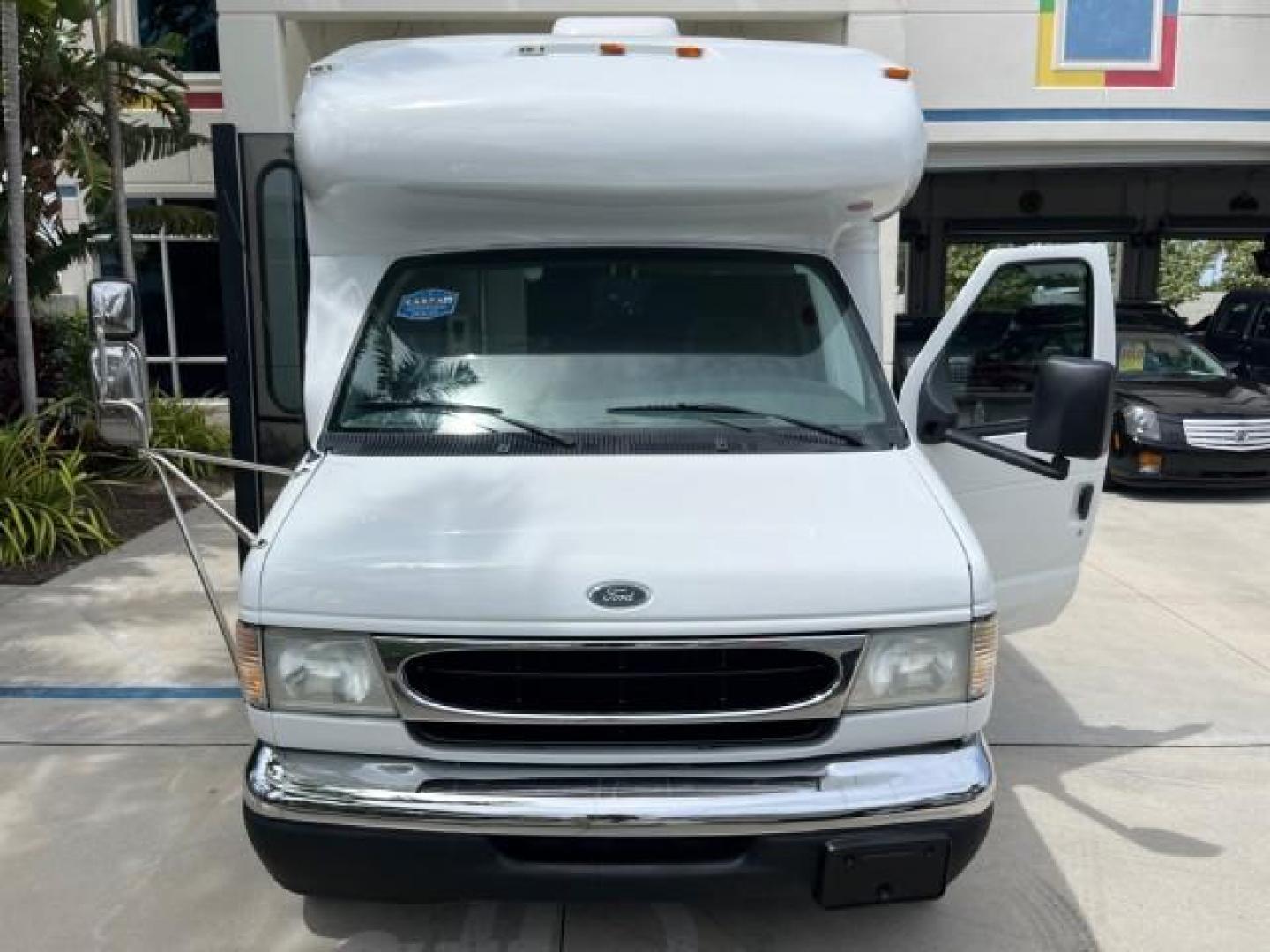 2002 Oxford White /Medium Graphite Ford Econoline Commercial Cutaway DUAL AC UNITS GENERATOR (1FDXE45S12H) with an 6.8L SOHC SEFI V10 Engine engine, Automatic transmission, located at 4701 North Dixie Hwy, Pompano Beach, FL, 33064, (954) 422-2889, 26.240938, -80.123474 - OUR WEBPAGE FLORIDACARS1.COM HAS OVER 100 PHOTOS AND FREE CARFAX LINK 2002 FORD ECONOLINE SUPER DUTY VAN ROAD READY WORK READY VIN: 1FDXE45S12HA08142 LOW MILES 84,809 CUTAWAY NO RECALLS 6.8L V10 6.8L V10 F SOHC FLORIDA OWNER GASOLINE 46 SERVICE RECORDS REAR WHEEL DRIVE DUALLY PUSH START GENERATOR 2 - Photo#68