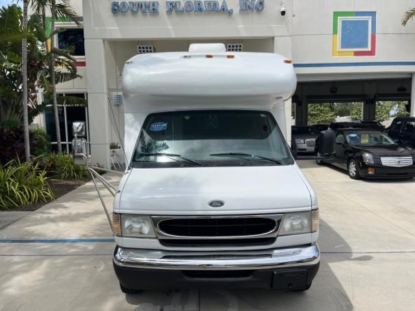 2002 Oxford White /Medium Graphite Ford Econoline Commercial Cutaway DUAL AC UNITS GENERATOR (1FDXE45S12H) with an 6.8L SOHC SEFI V10 Engine engine, Automatic transmission, located at 4701 North Dixie Hwy, Pompano Beach, FL, 33064, (954) 422-2889, 26.240938, -80.123474 - OUR WEBPAGE FLORIDACARS1.COM HAS OVER 100 PHOTOS AND FREE CARFAX LINK 2002 FORD ECONOLINE SUPER DUTY VAN ROAD READY WORK READY VIN: 1FDXE45S12HA08142 LOW MILES 84,809 CUTAWAY NO RECALLS 6.8L V10 6.8L V10 F SOHC FLORIDA OWNER GASOLINE 46 SERVICE RECORDS REAR WHEEL DRIVE DUALLY PUSH START GENERATOR 2 - Photo#82