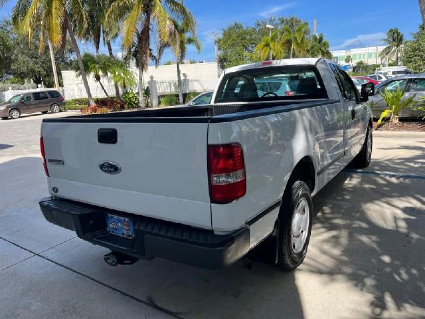 2005 Oxford White /Flint Ford F-150 1 FL XL LOW MILES 63,772 (1FTRF12245N) with an 4.2L EFI V6 Engine engine, Automatic transmission, located at 4701 North Dixie Hwy, Pompano Beach, FL, 33064, (954) 422-2889, 26.240938, -80.123474 - OUR WEBPAGE FLORIDACARS1.COM HAS OVER 100 PHOTOS AND FREE CARFAX LINK 2005 FORD F-150 XL ROAD READY WORK READY VIN: 1FTRF12245NA98700 NO ACCIDENTS 4,2L V6 4.2L V6 F OHV NO RECALLS 8.0 FT BED GASOLINE 1 OWNER FLORIDA REAR WHEEL DRIVE VERY CLEAN LOW MILES 63,772 ABS Brakes Air Conditioning CD Audio AM - Photo#75