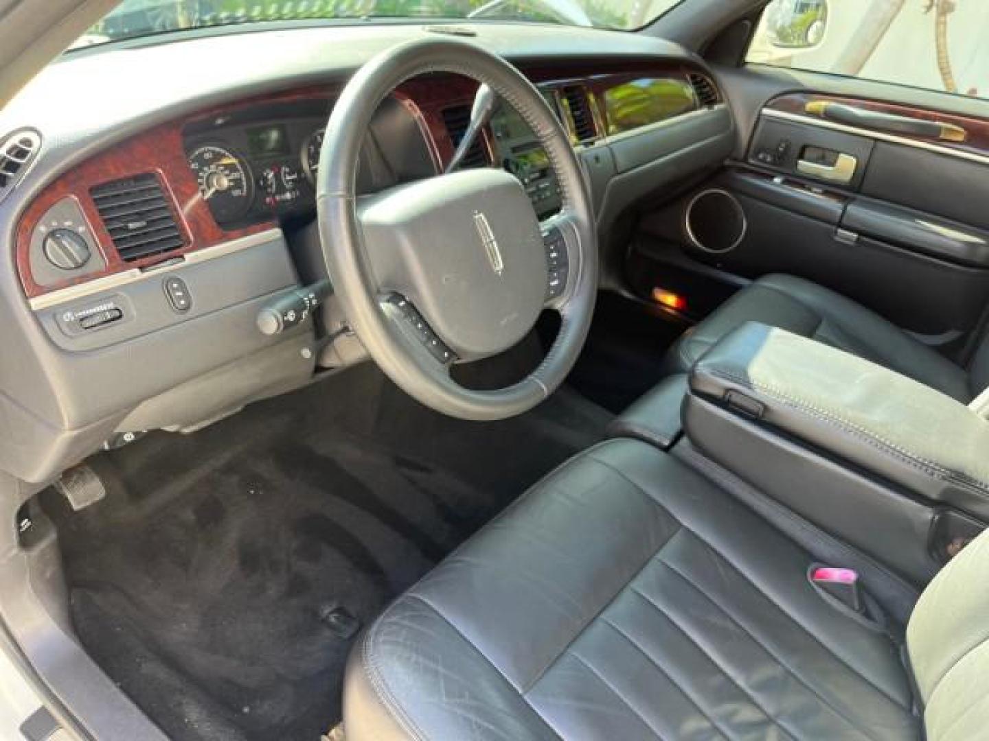 2009 Vibrant White /Black Lincoln Town Car Executive w/Limousine LO MI 79,993 (2L1FM88W09X) with an 4.6L SOHC EFI V8 Engine engine, Automatic transmission, located at 4701 North Dixie Hwy, Pompano Beach, FL, 33064, (954) 422-2889, 26.240938, -80.123474 - OUR WEBPAGE FLORIDACARS1.COM HAS OVER 100 PHOTOS AND FREE CARFAX LINK 2009 LINCOLN TOWN CAR EXECUTIVE L ROAD READY WORK READY VIN: 2L1FM88W09X601250 NO ACCIDENTS 4.6L V8 LIMOUSINE DA BRYAN COACH NO RECALLS 24 MPG 4.6L V8 F SOHC 16V 27 FT LONG LEATHER SEATS GASOLINE 7 PASSENGERS LOW MILES 79,993 REAR - Photo#70