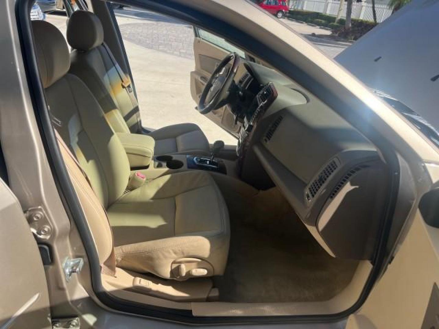 2006 Sand Storm /Ebony Cadillac CTS FL NAV LOW MILES 14,110 (1G6DP577560) with an 3.6L V6 VVT Engine engine, Automatic transmission, located at 4701 North Dixie Hwy, Pompano Beach, FL, 33064, (954) 422-2889, 26.240938, -80.123474 - OUR WEBPAGE FLORIDACARS1.COM HAS OVER 100 PHOTOS AND FREE CARFAX LINK 2006 CADILLAC CTS ROAD READY 3.6L V6 VIN: 1G6DP577560193089 NO ACCIDENTS SEDAN 4 DR NO RECALLS 27 MPG 3.6L V6 F DUAL AC FLORIDA OWNER GASOLINE POWER SUNROOF LOW MILES 14,110 REAR WHEEL DRIVE NAVIGATION POWER LEATHER SEATS Anti-The - Photo#12