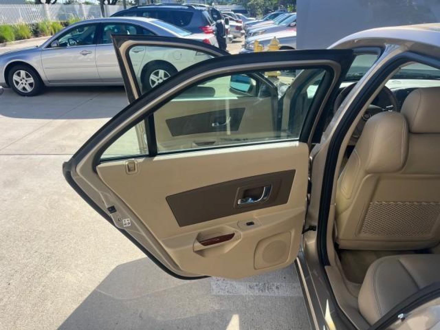 2006 Sand Storm /Ebony Cadillac CTS FL NAV LOW MILES 14,110 (1G6DP577560) with an 3.6L V6 VVT Engine engine, Automatic transmission, located at 4701 North Dixie Hwy, Pompano Beach, FL, 33064, (954) 422-2889, 26.240938, -80.123474 - OUR WEBPAGE FLORIDACARS1.COM HAS OVER 100 PHOTOS AND FREE CARFAX LINK 2006 CADILLAC CTS ROAD READY 3.6L V6 VIN: 1G6DP577560193089 NO ACCIDENTS SEDAN 4 DR NO RECALLS 27 MPG 3.6L V6 F DUAL AC FLORIDA OWNER GASOLINE POWER SUNROOF LOW MILES 14,110 REAR WHEEL DRIVE NAVIGATION POWER LEATHER SEATS Anti-The - Photo#13