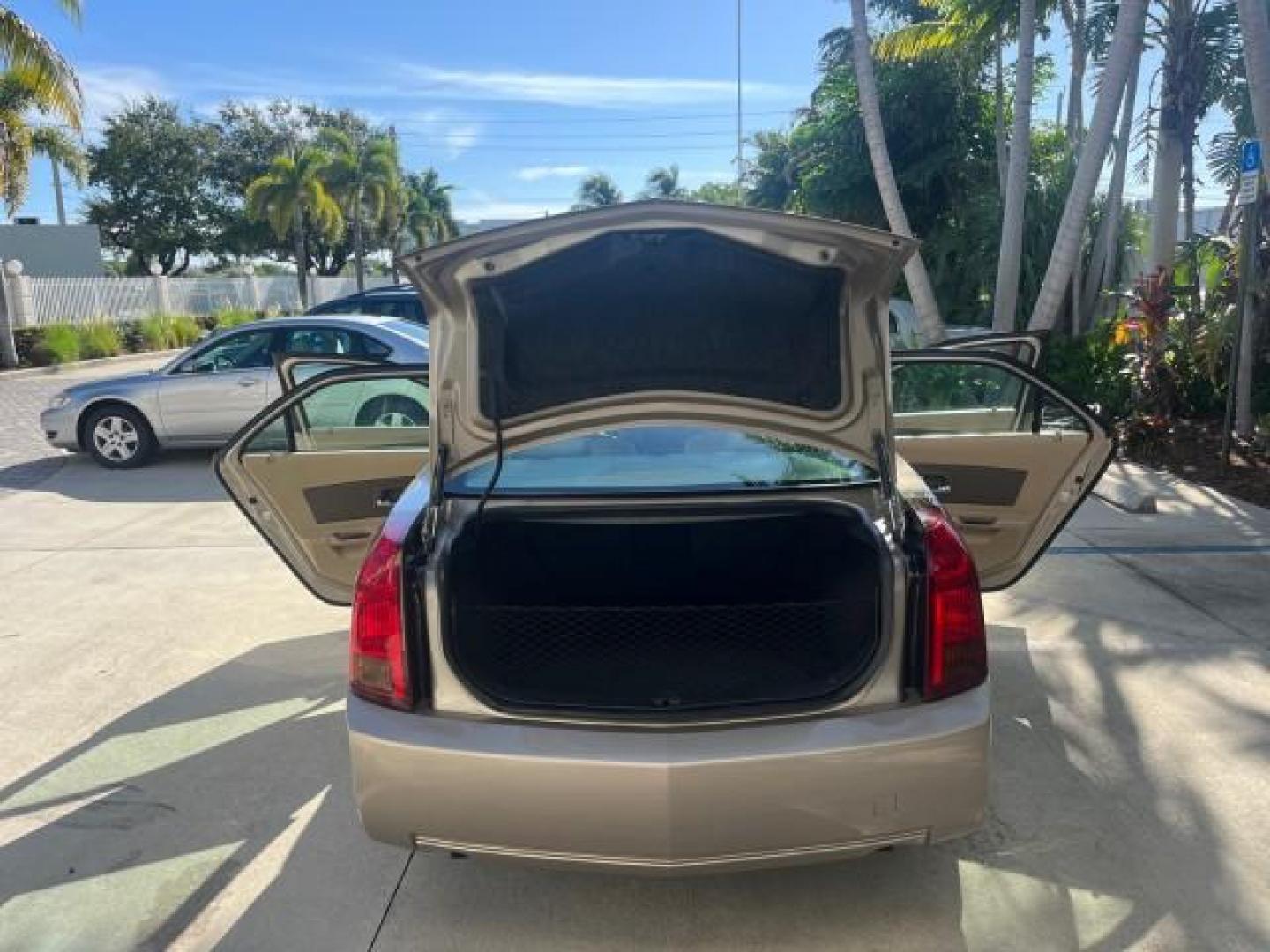 2006 Sand Storm /Ebony Cadillac CTS FL NAV LOW MILES 14,110 (1G6DP577560) with an 3.6L V6 VVT Engine engine, Automatic transmission, located at 4701 North Dixie Hwy, Pompano Beach, FL, 33064, (954) 422-2889, 26.240938, -80.123474 - OUR WEBPAGE FLORIDACARS1.COM HAS OVER 100 PHOTOS AND FREE CARFAX LINK 2006 CADILLAC CTS ROAD READY 3.6L V6 VIN: 1G6DP577560193089 NO ACCIDENTS SEDAN 4 DR NO RECALLS 27 MPG 3.6L V6 F DUAL AC FLORIDA OWNER GASOLINE POWER SUNROOF LOW MILES 14,110 REAR WHEEL DRIVE NAVIGATION POWER LEATHER SEATS Anti-The - Photo#15