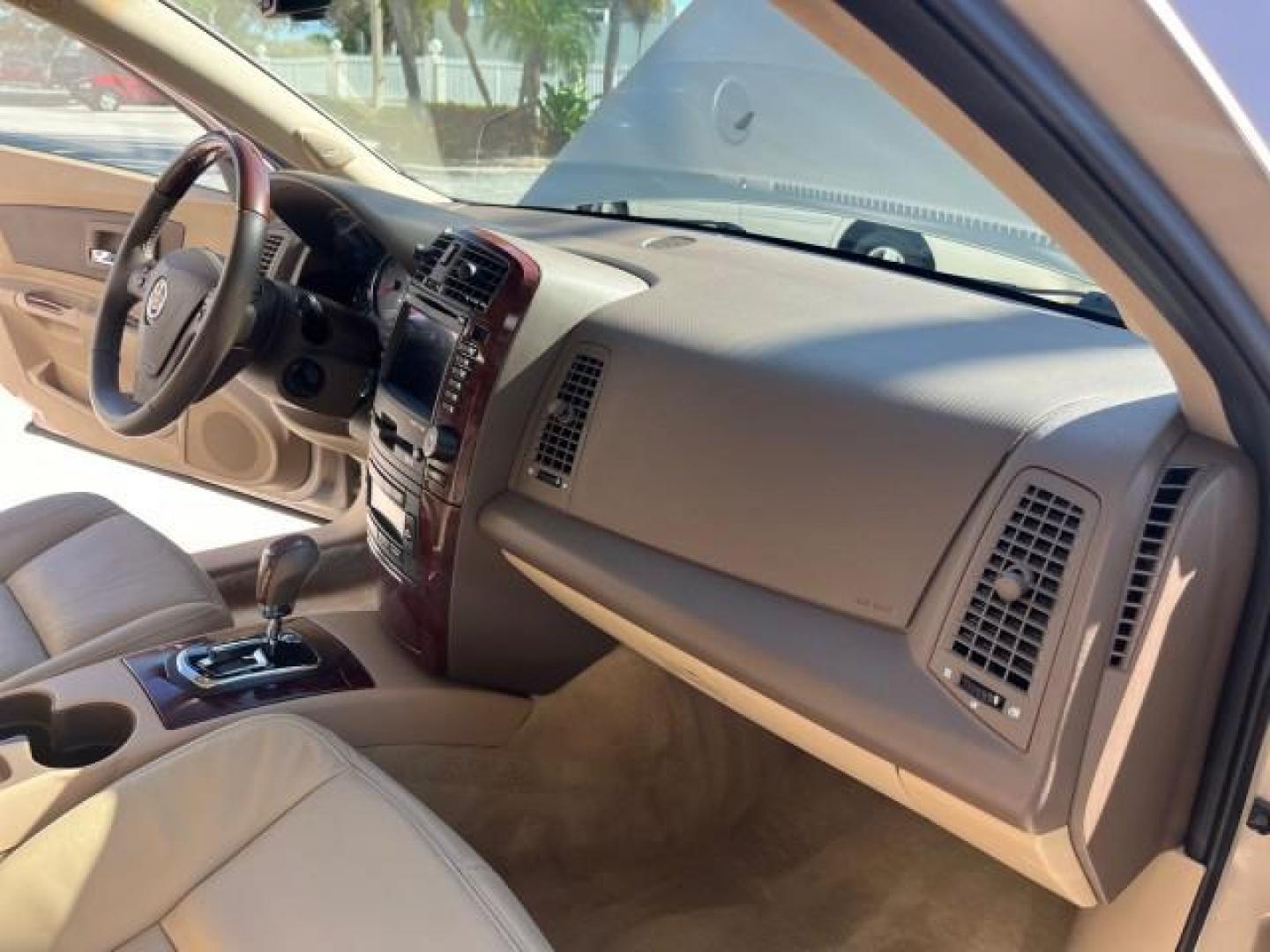 2006 Sand Storm /Ebony Cadillac CTS FL NAV LOW MILES 14,110 (1G6DP577560) with an 3.6L V6 VVT Engine engine, Automatic transmission, located at 4701 North Dixie Hwy, Pompano Beach, FL, 33064, (954) 422-2889, 26.240938, -80.123474 - OUR WEBPAGE FLORIDACARS1.COM HAS OVER 100 PHOTOS AND FREE CARFAX LINK 2006 CADILLAC CTS ROAD READY 3.6L V6 VIN: 1G6DP577560193089 NO ACCIDENTS SEDAN 4 DR NO RECALLS 27 MPG 3.6L V6 F DUAL AC FLORIDA OWNER GASOLINE POWER SUNROOF LOW MILES 14,110 REAR WHEEL DRIVE NAVIGATION POWER LEATHER SEATS Anti-The - Photo#27