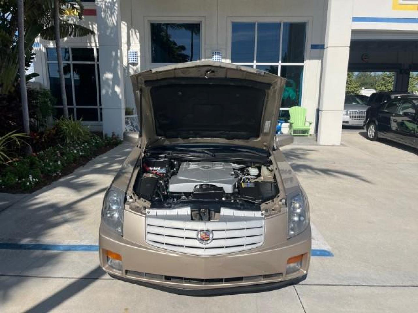 2006 Sand Storm /Ebony Cadillac CTS FL NAV LOW MILES 14,110 (1G6DP577560) with an 3.6L V6 VVT Engine engine, Automatic transmission, located at 4701 North Dixie Hwy, Pompano Beach, FL, 33064, (954) 422-2889, 26.240938, -80.123474 - OUR WEBPAGE FLORIDACARS1.COM HAS OVER 100 PHOTOS AND FREE CARFAX LINK 2006 CADILLAC CTS ROAD READY 3.6L V6 VIN: 1G6DP577560193089 NO ACCIDENTS SEDAN 4 DR NO RECALLS 27 MPG 3.6L V6 F DUAL AC FLORIDA OWNER GASOLINE POWER SUNROOF LOW MILES 14,110 REAR WHEEL DRIVE NAVIGATION POWER LEATHER SEATS Anti-The - Photo#70