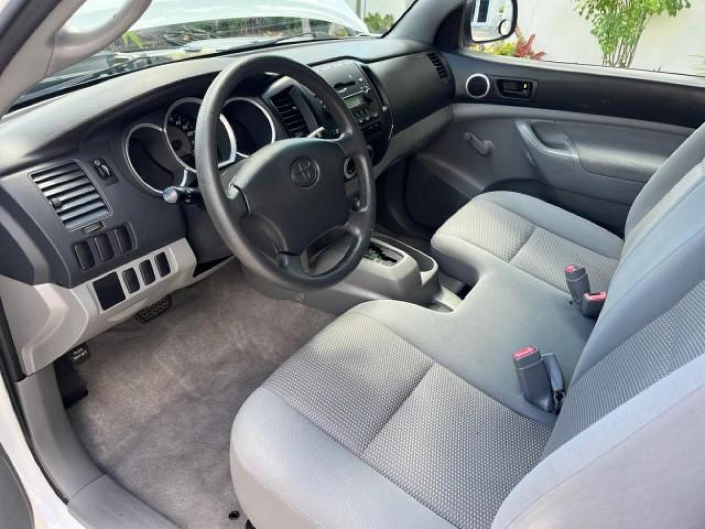 2007 Super White /Gray Toyota Tacoma AUTO AC LOW MILES 48,770 (5TENX22N27Z) with an 2.7L DOHC EFI 16-Valve I4 VVT-i Engine engine, Automatic transmission, located at 4701 North Dixie Hwy, Pompano Beach, FL, 33064, (954) 422-2889, 26.240938, -80.123474 - OUR WEBPAGE FLORIDACARS1.COM HAS OVER 100 PHOTOS AND FREE CARFAX LINK 2007 TOYOTA TACOMA ROAD READY WORK READY VIN: 5TENX22N27Z342629 NO RECALLS 2.7L I4 PICKUP LOW MILES 48,770 2.7L I4 F DOHC 16V 6,1 FT BED LENGTH GASOLINE 6 SERVICE RECORDS REAR WHEEL DRIVE 28 MPG 6.1' Bed Length Braking Assist Elec - Photo#56