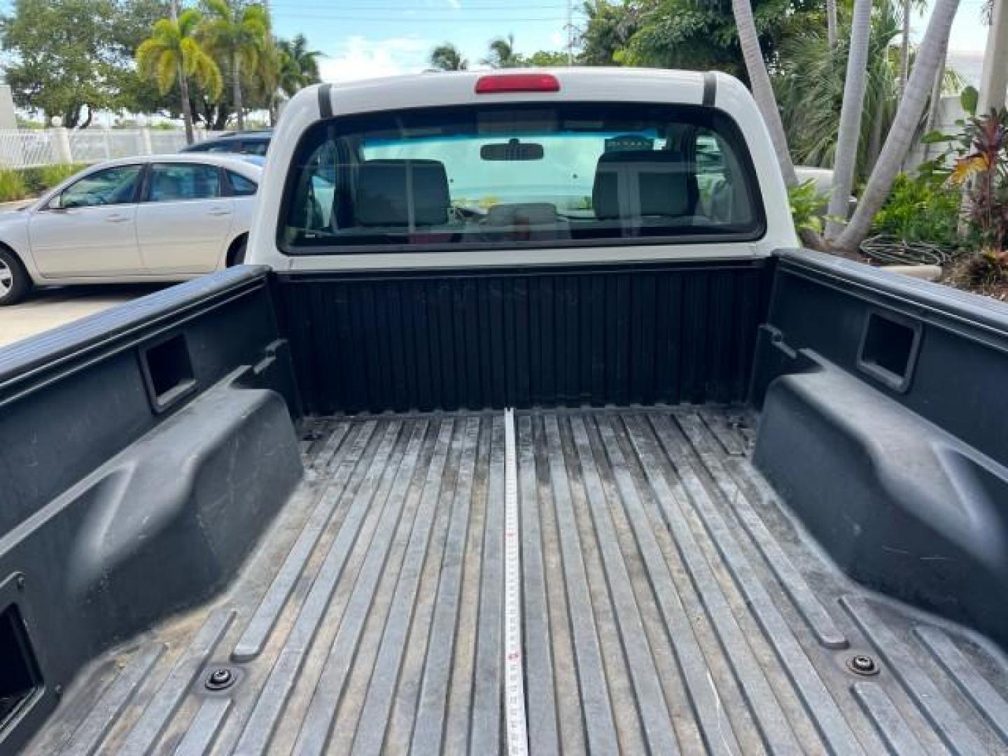 2007 Super White /Gray Toyota Tacoma AUTO AC LOW MILES 48,770 (5TENX22N27Z) with an 2.7L DOHC EFI 16-Valve I4 VVT-i Engine engine, Automatic transmission, located at 4701 North Dixie Hwy, Pompano Beach, FL, 33064, (954) 422-2889, 26.240938, -80.123474 - OUR WEBPAGE FLORIDACARS1.COM HAS OVER 100 PHOTOS AND FREE CARFAX LINK 2007 TOYOTA TACOMA ROAD READY WORK READY VIN: 5TENX22N27Z342629 NO RECALLS 2.7L I4 PICKUP LOW MILES 48,770 2.7L I4 F DOHC 16V 6,1 FT BED LENGTH GASOLINE 6 SERVICE RECORDS REAR WHEEL DRIVE 28 MPG 6.1' Bed Length Braking Assist Elec - Photo#58